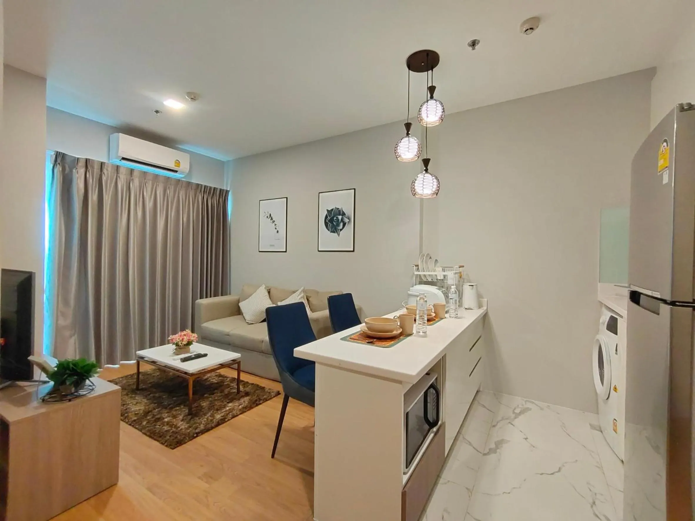 One-Bedroom Apartment with Balcony in Astra Sky River Chiang Mai by Fang