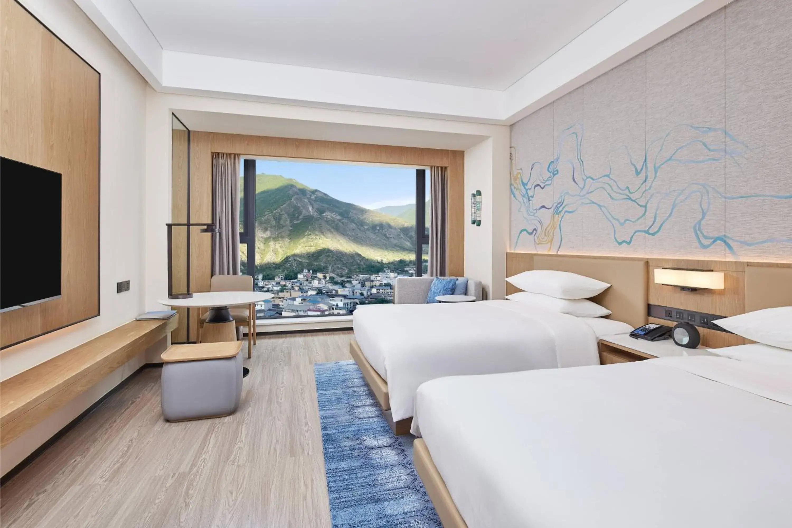 Executive Double Room with Two Double Beds and Mountain View in Delta Hotels by Marriott Jiuzhaigou Executive Double Room with Two Double Beds and Mountain View in Delta Hotels by Marriott Jiuzhaigou