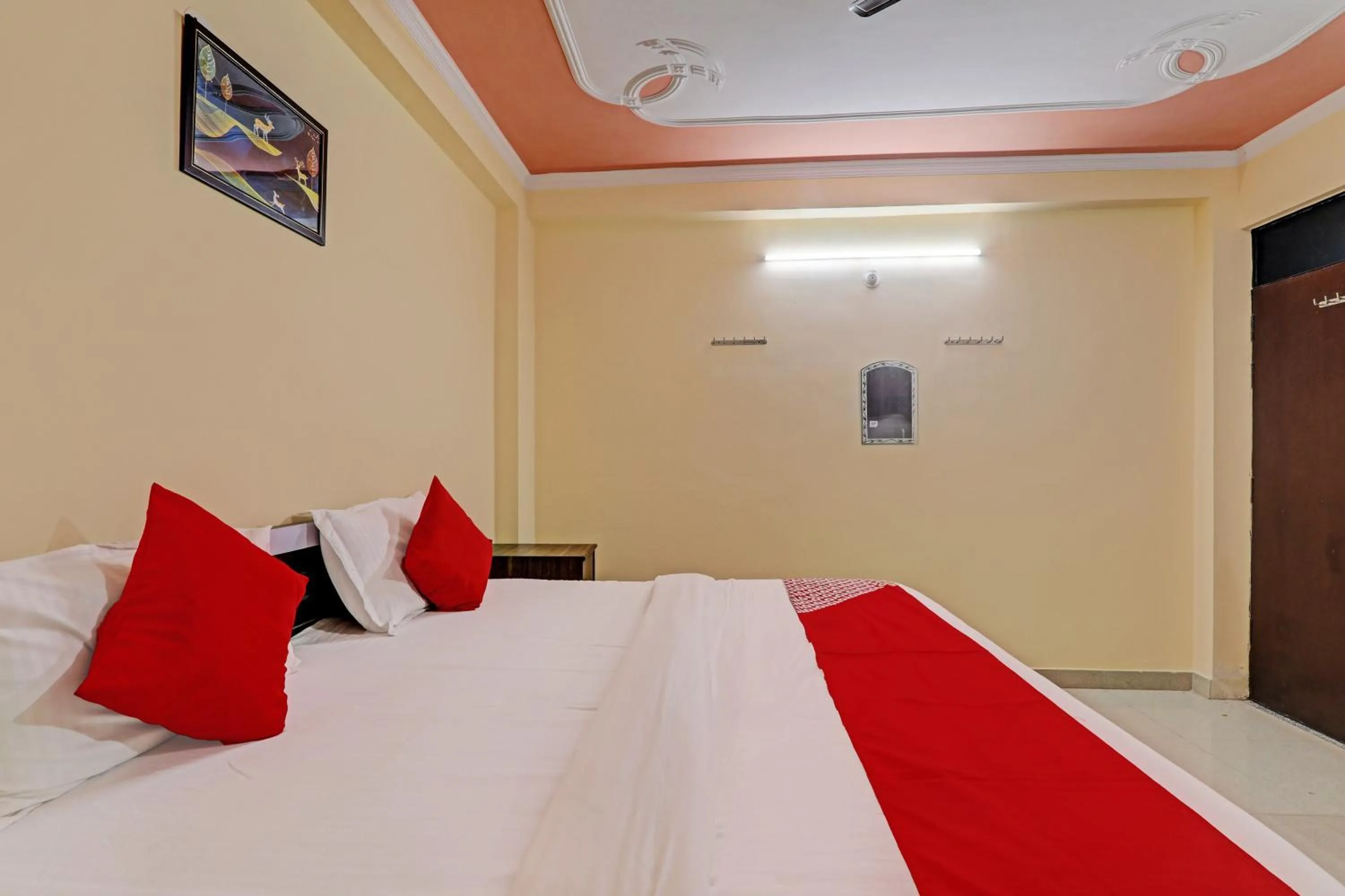 Bedroom in Hotel O Fort INN