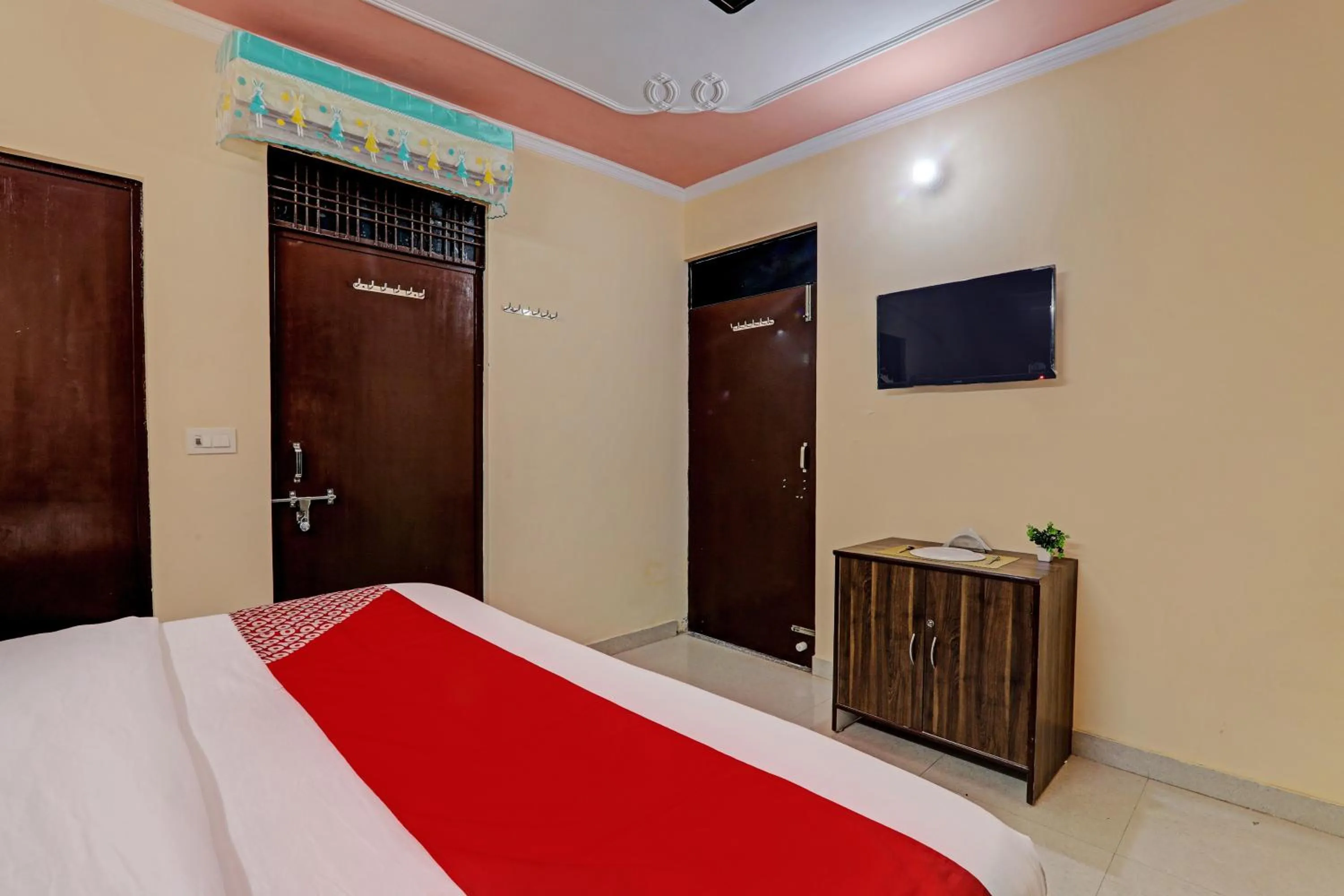 Bedroom in Hotel O Fort INN