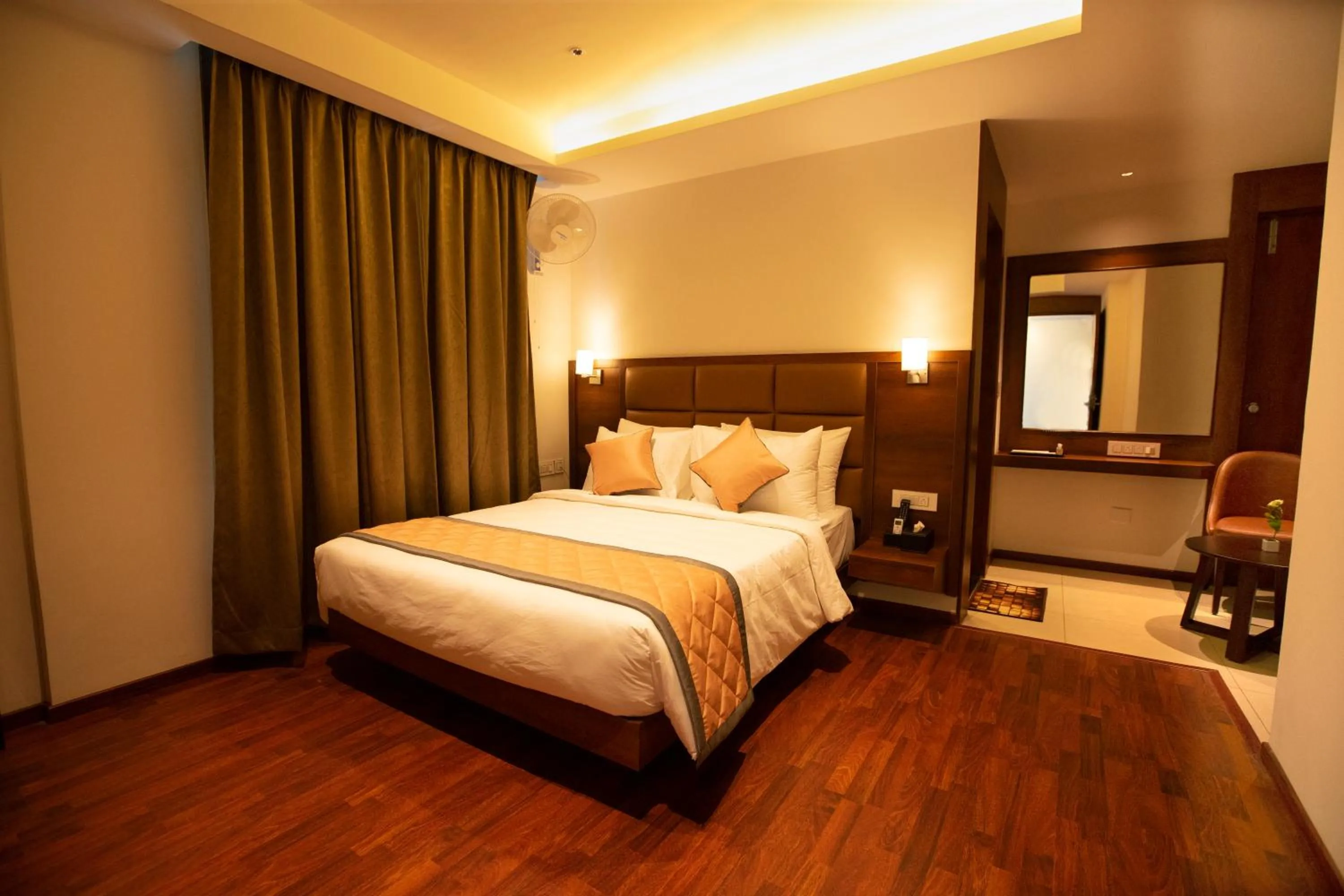 Bed in Golden Fortune Inn Hotel