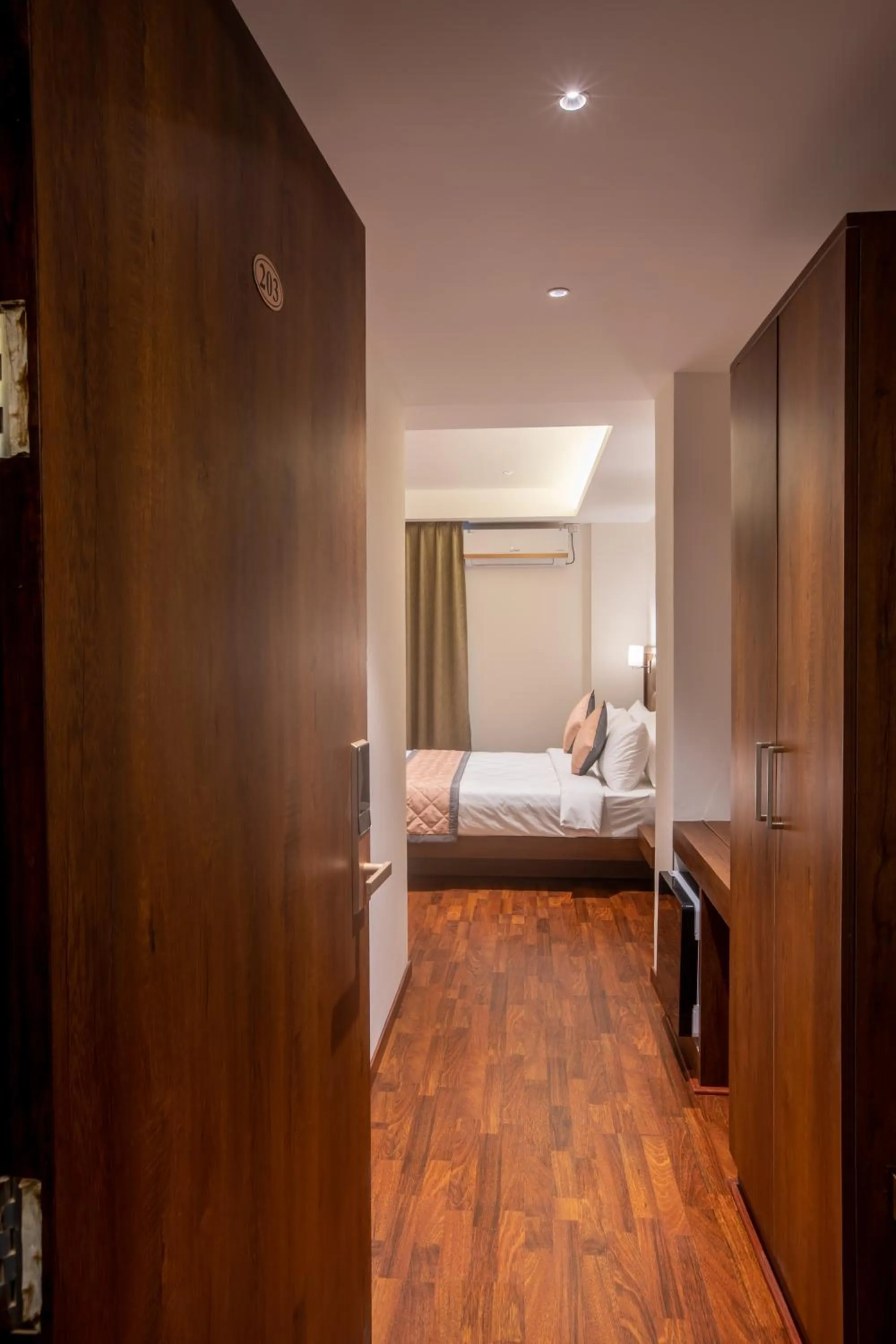 Bed in Golden Fortune Inn Hotel