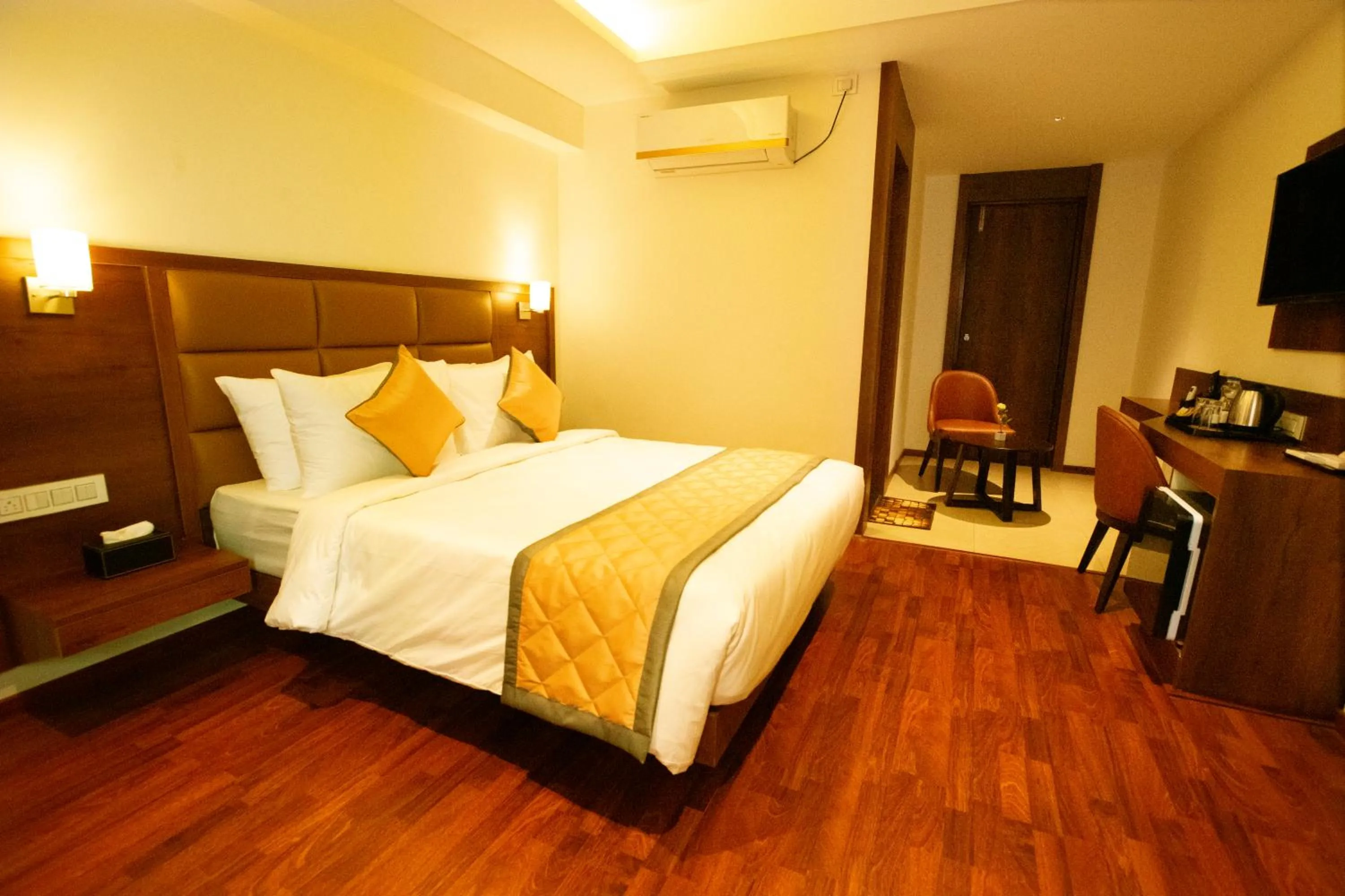 Bed in Golden Fortune Inn Hotel