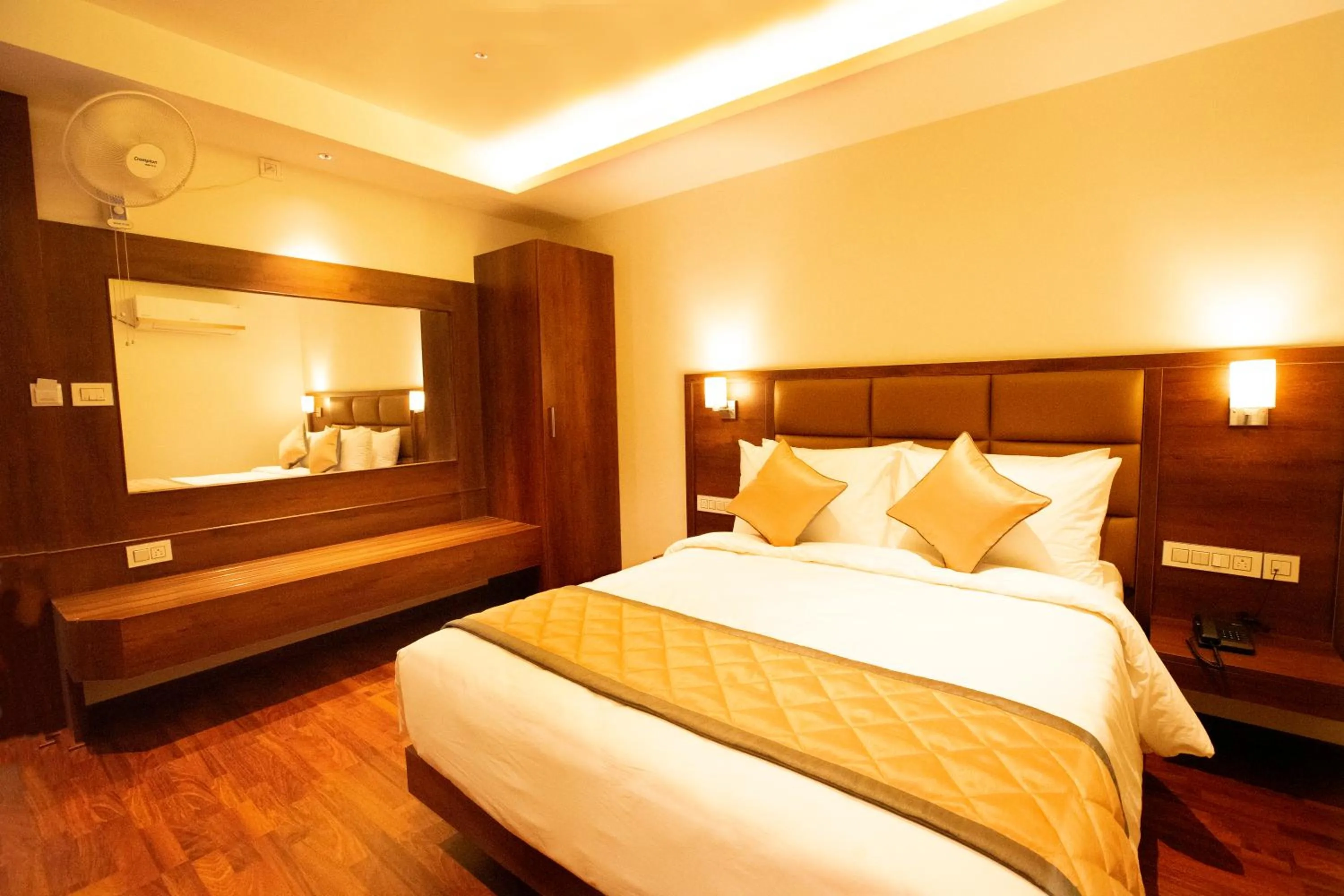 Bed in Golden Fortune Inn Hotel