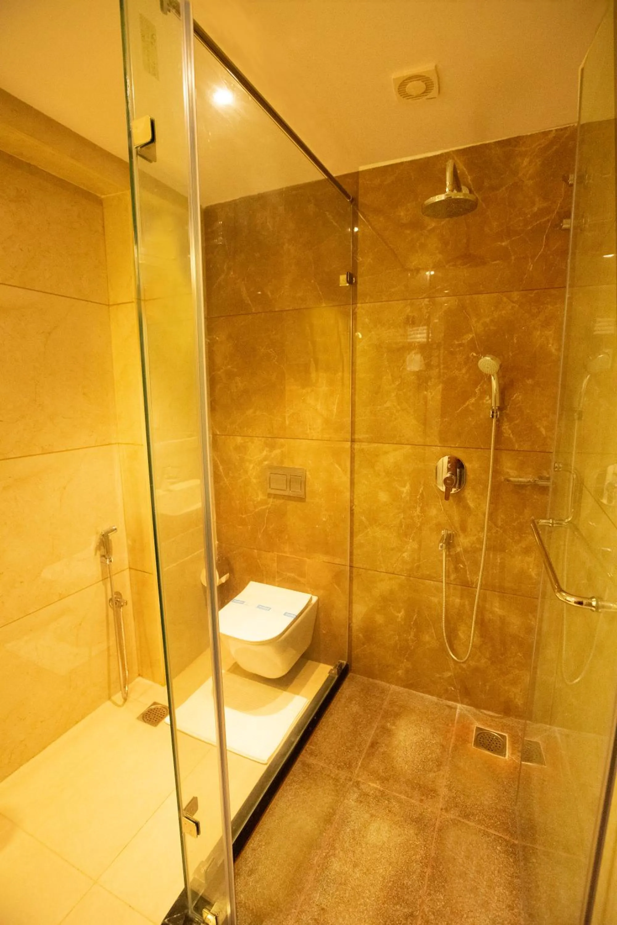 Shower in Golden Fortune Inn Hotel