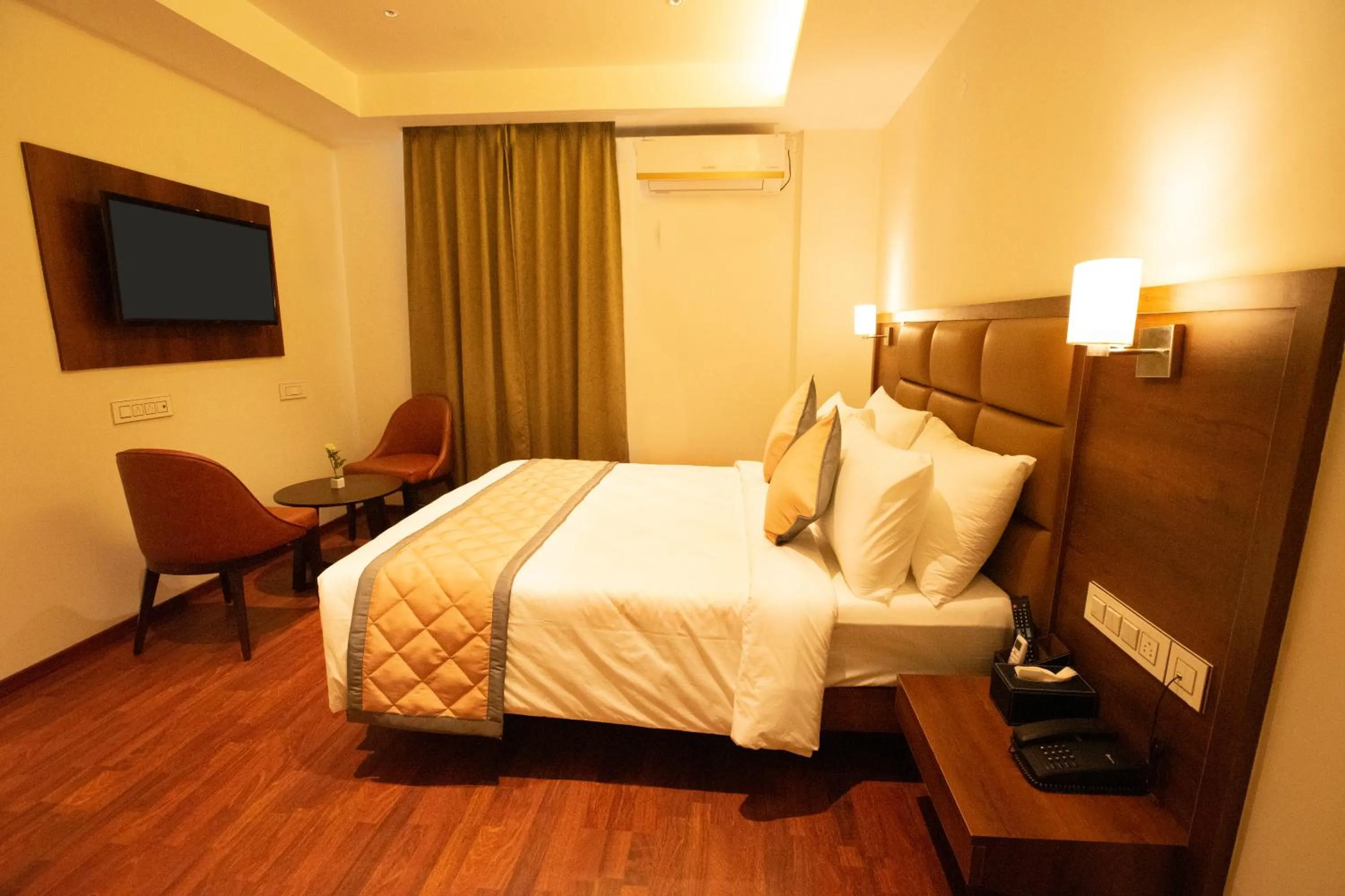 Bed in Golden Fortune Inn Hotel