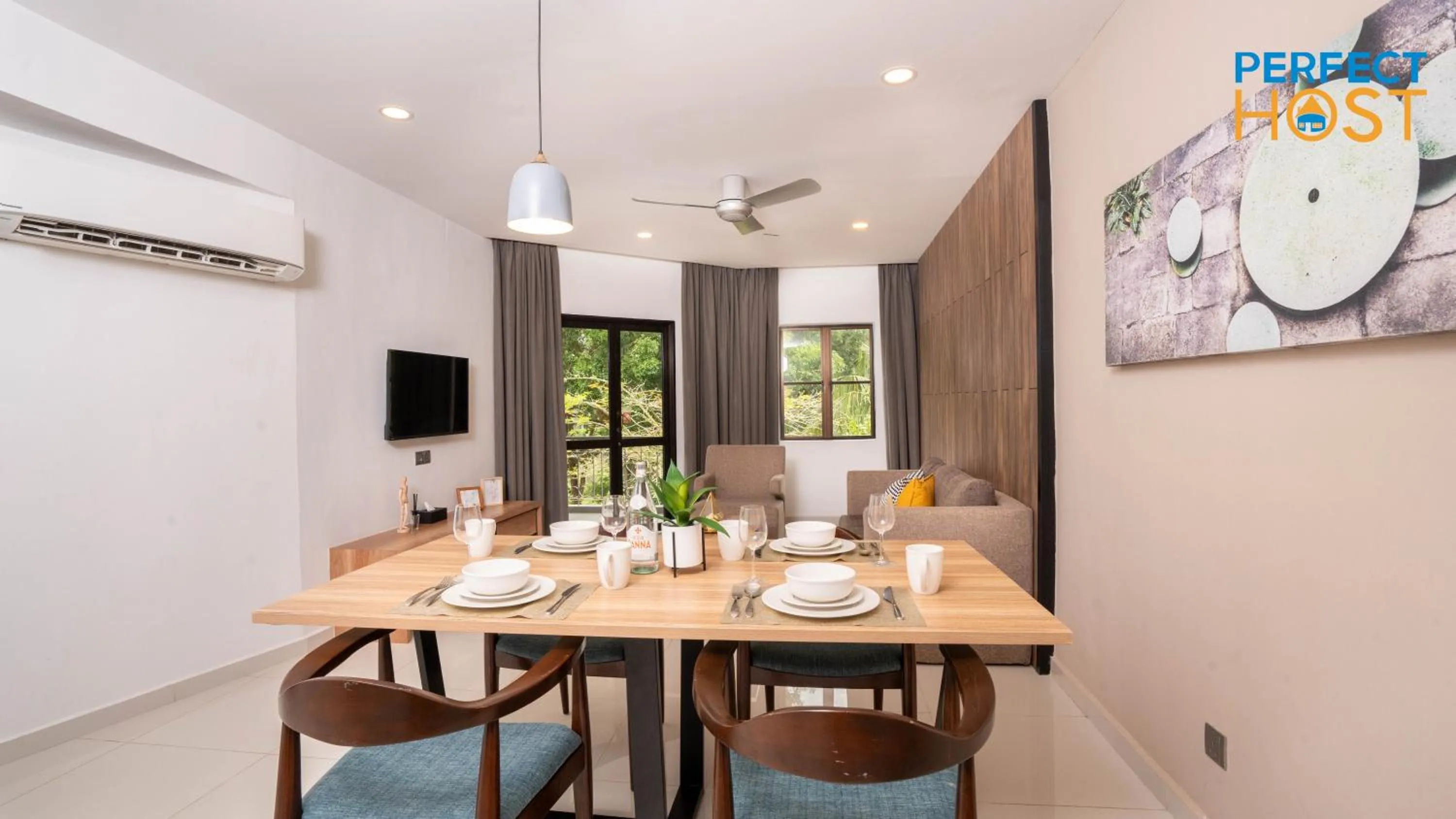 Dining area in Damai Laut Escape by Perfect Host