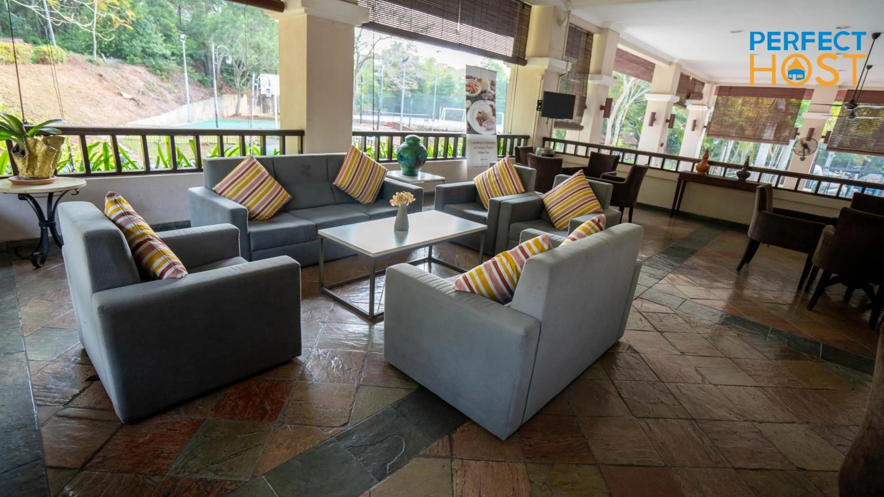 Seating area in Damai Laut Escape by Perfect Host