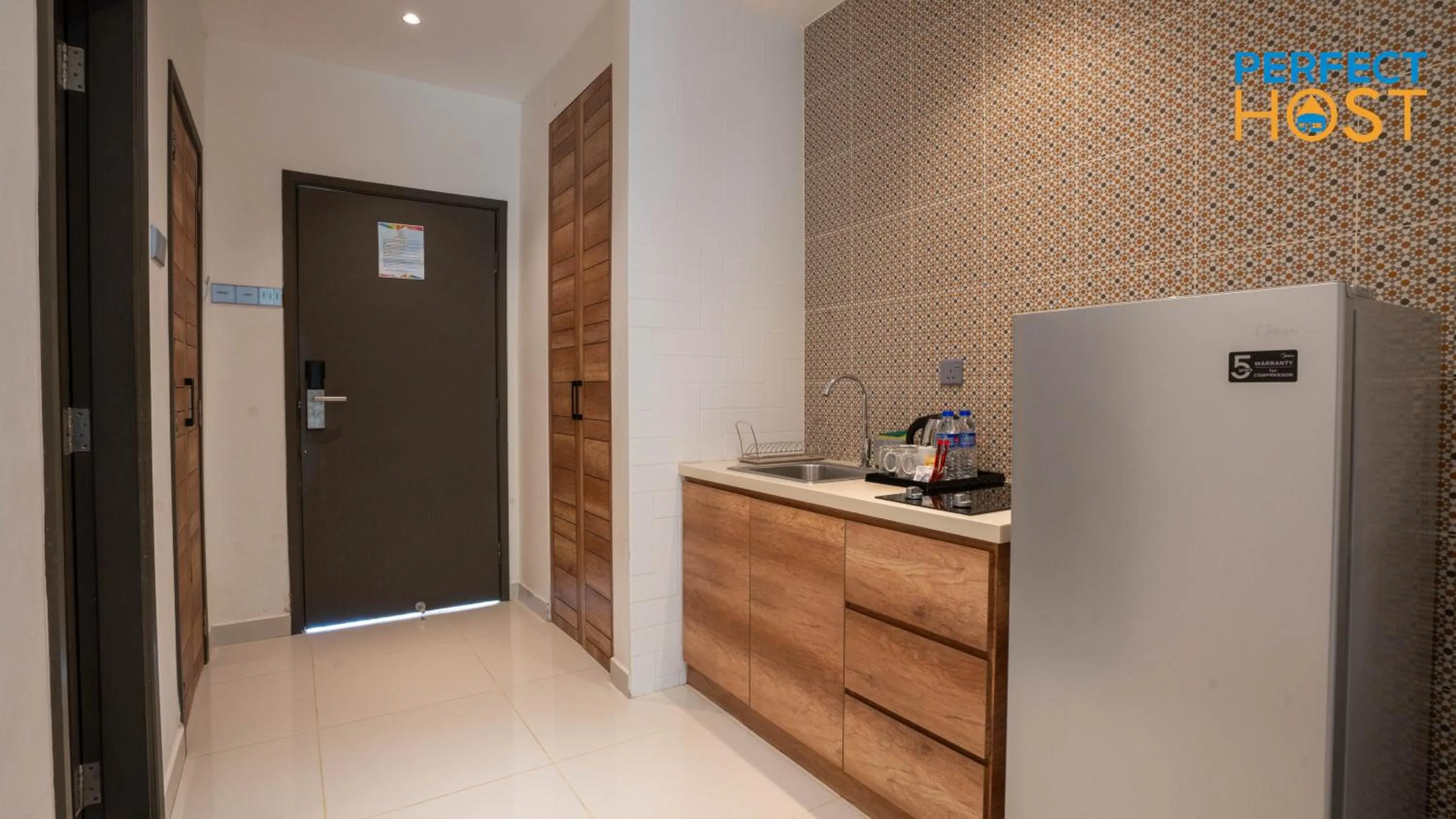 Kitchen or kitchenette in Damai Laut Escape by Perfect Host