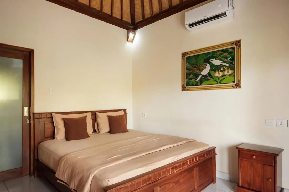 Bed in TwoSpaces Living at Balian Green Lagoon