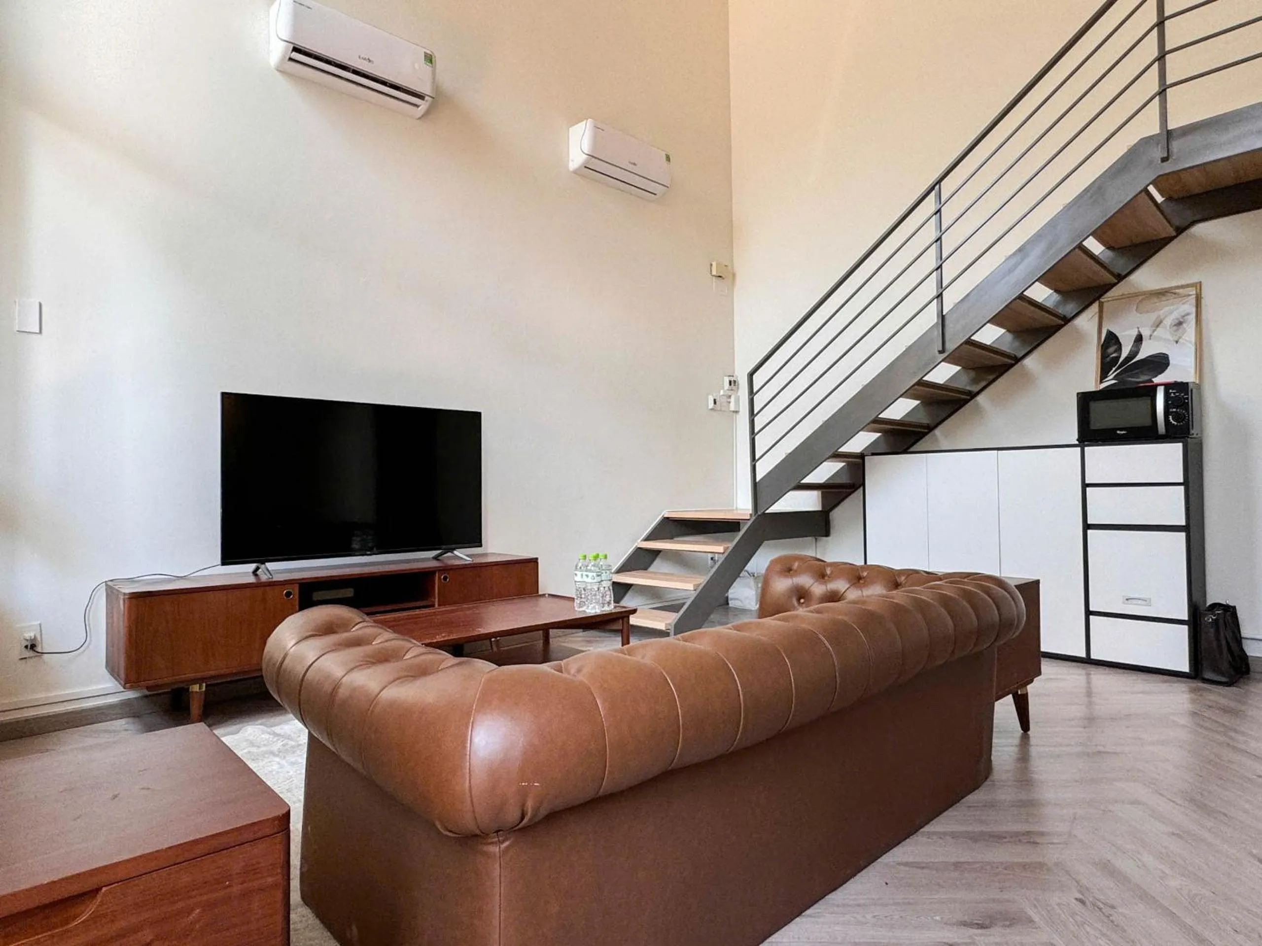 TV and multimedia in Zeus Living - Room in Villas An Phu