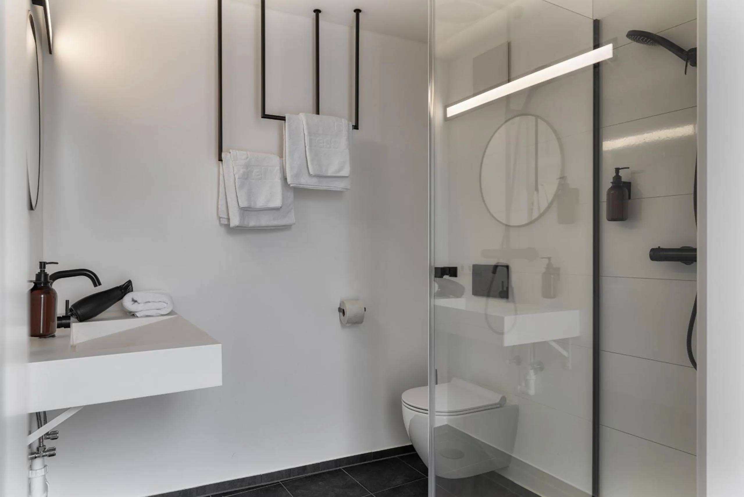 Bathroom in Motel by Maier Feldkirch - kontaktloser Check-in