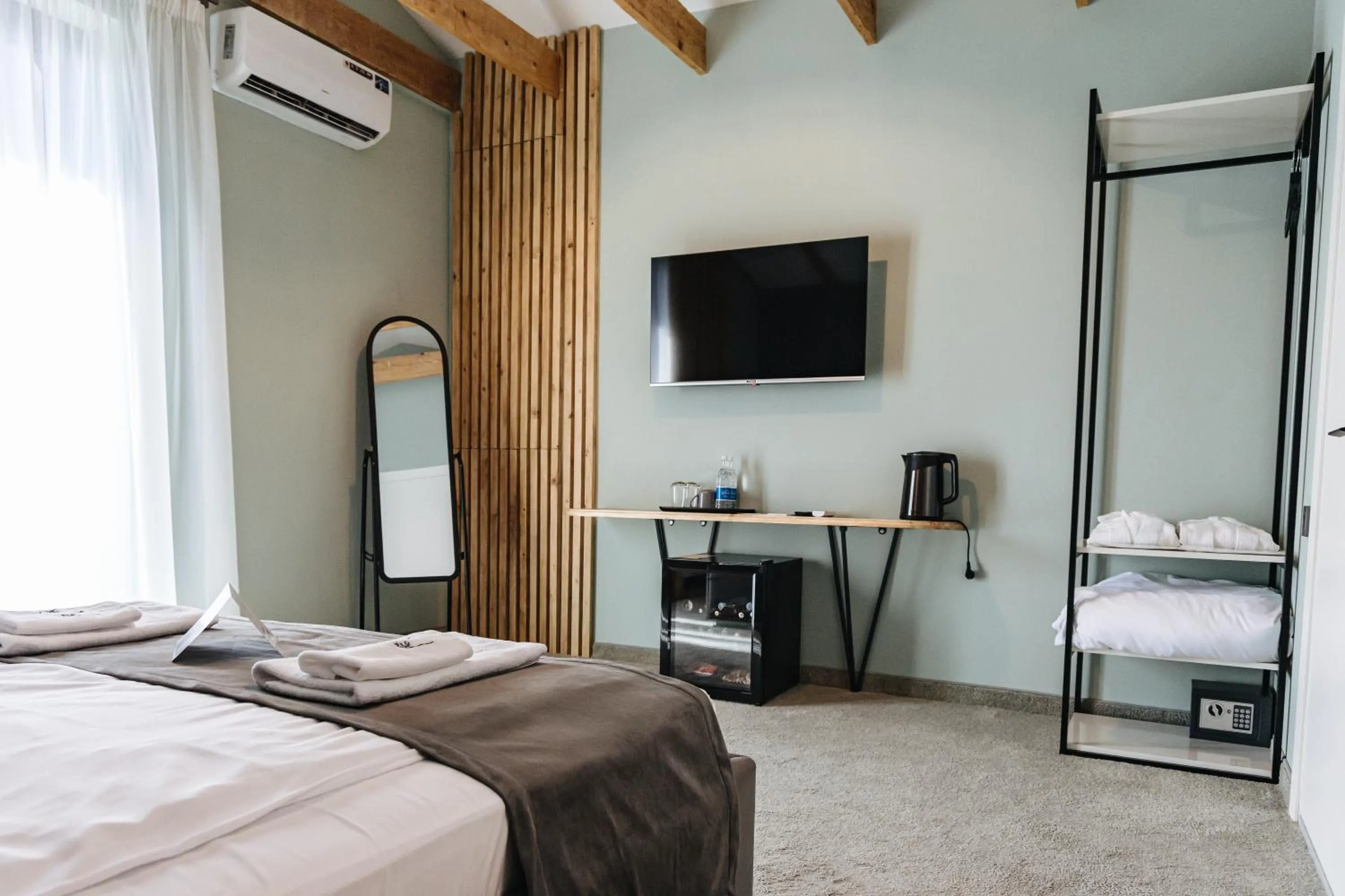 Bed in Ariam Boutique Hotel