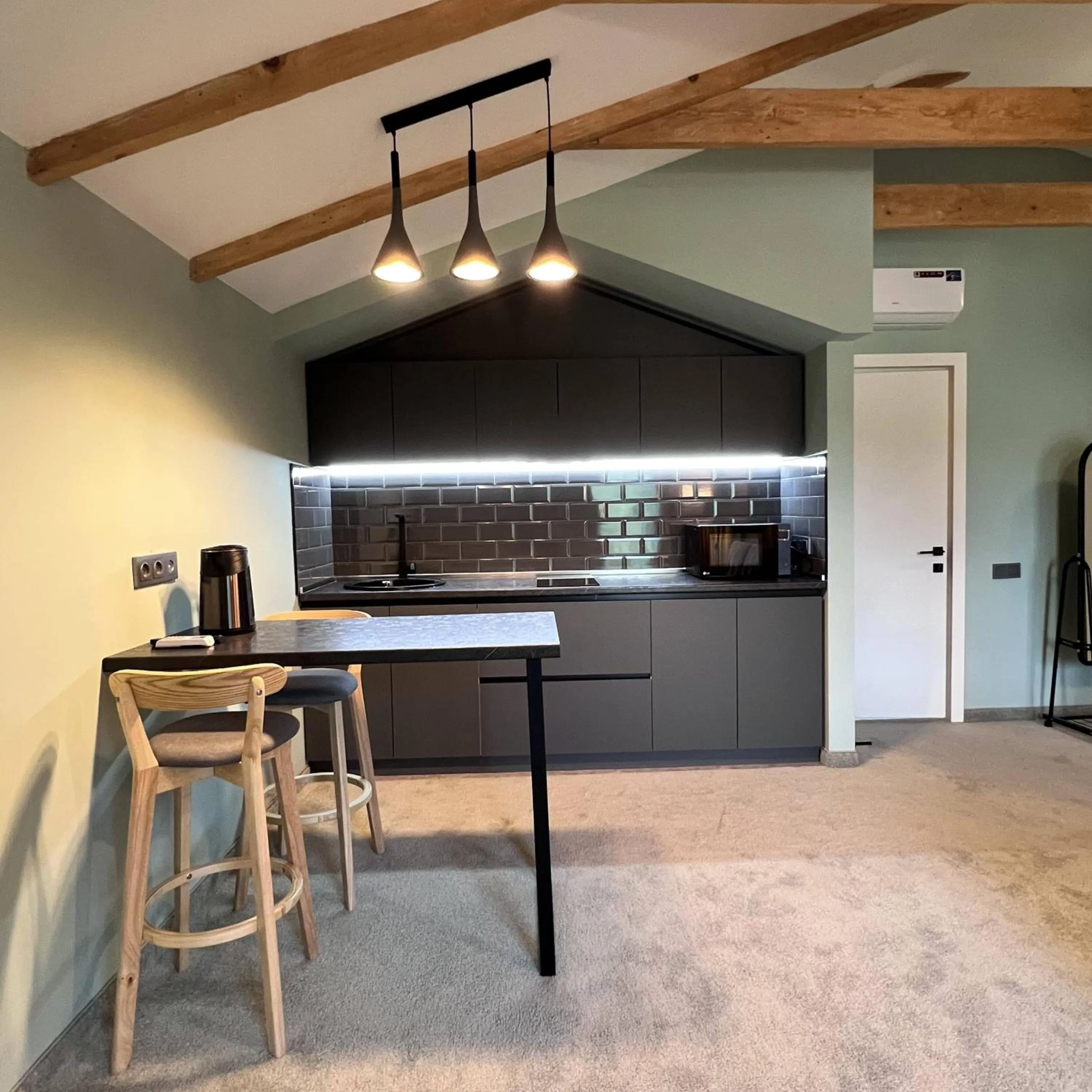 Kitchen or kitchenette in Ariam Boutique Hotel