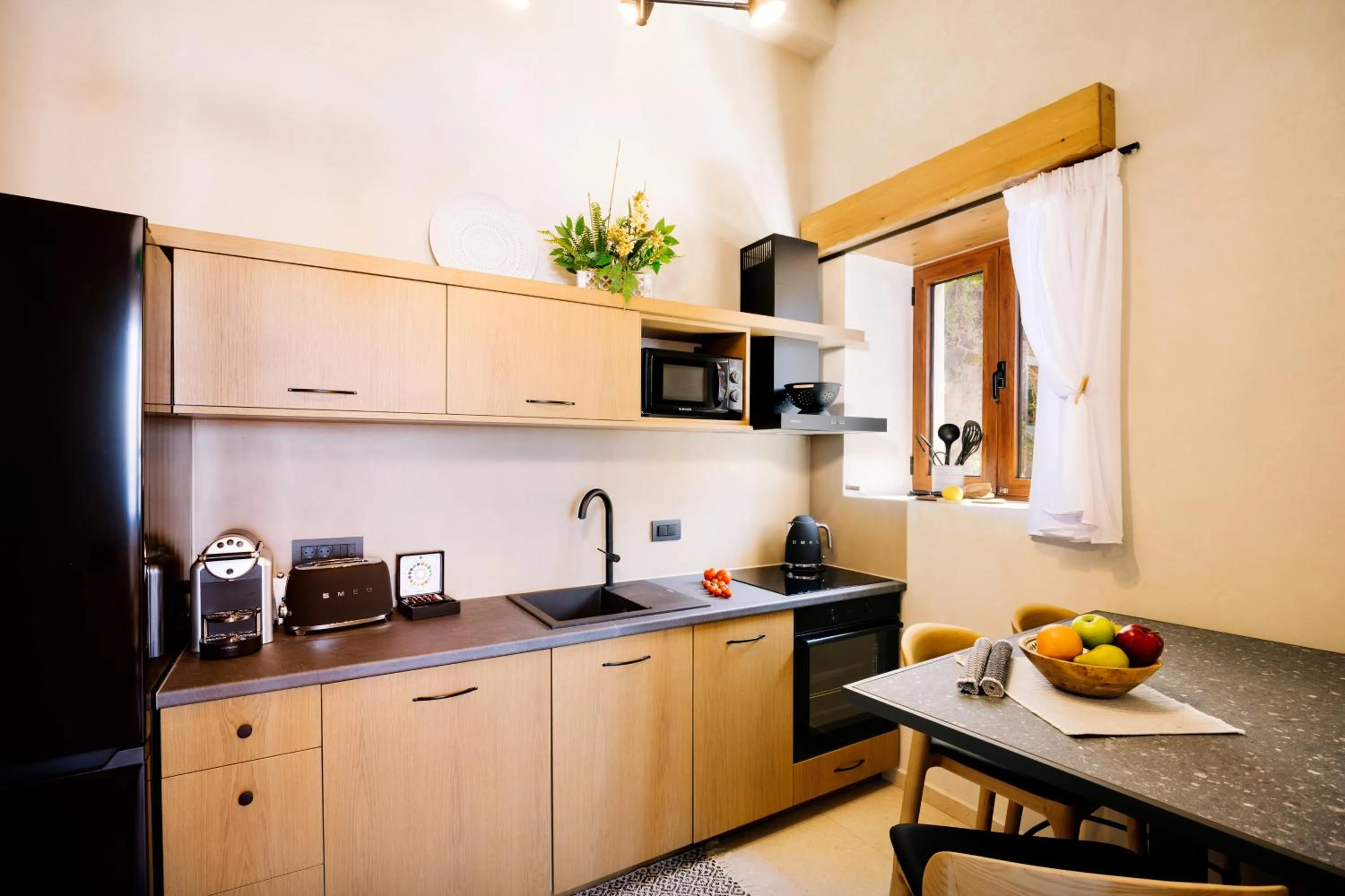 Kitchen or kitchenette in Mirthea Suites