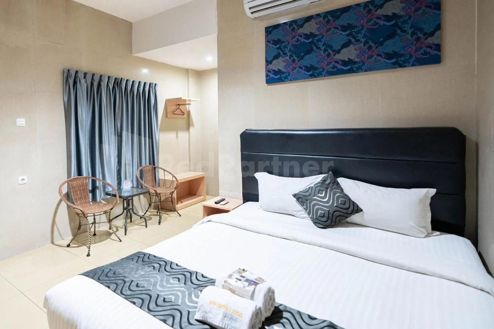 Bed in New Gentala Hotel Medan RedPartner