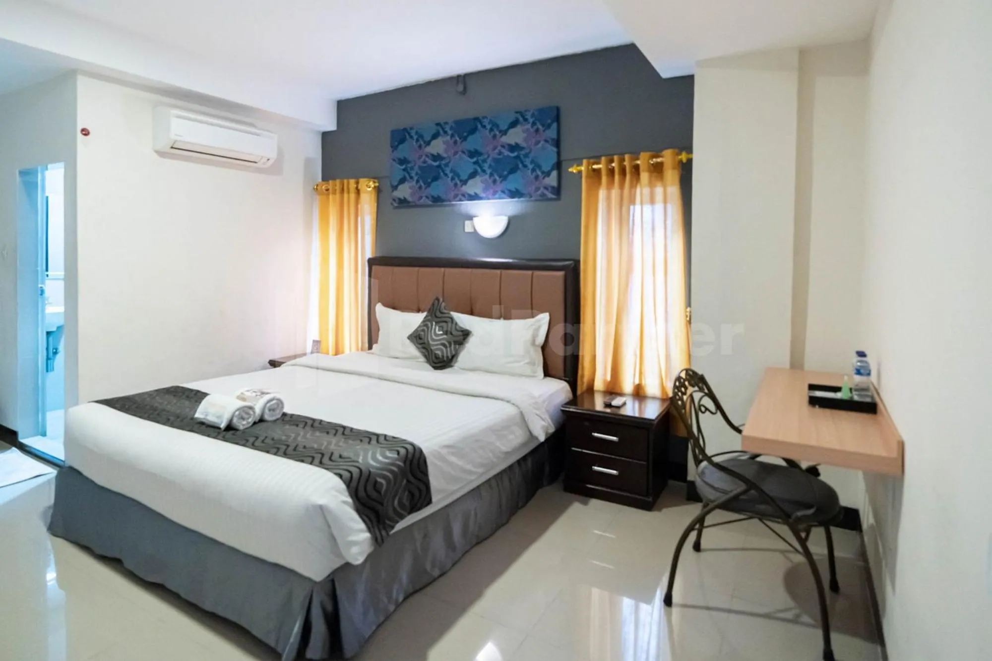 Bed in New Gentala Hotel Medan RedPartner