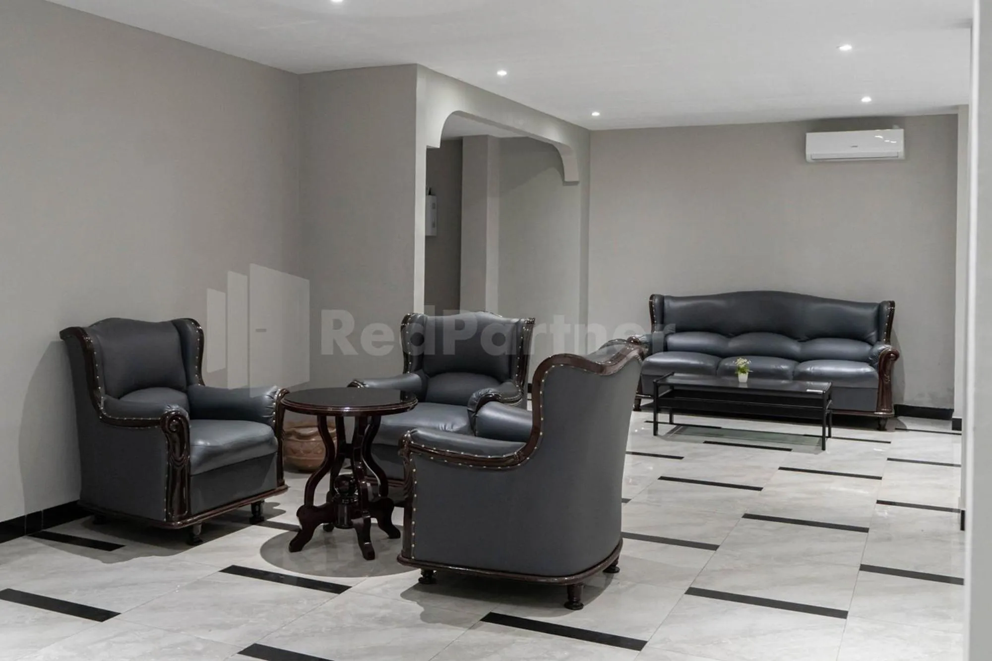 Seating area in New Gentala Hotel Medan RedPartner