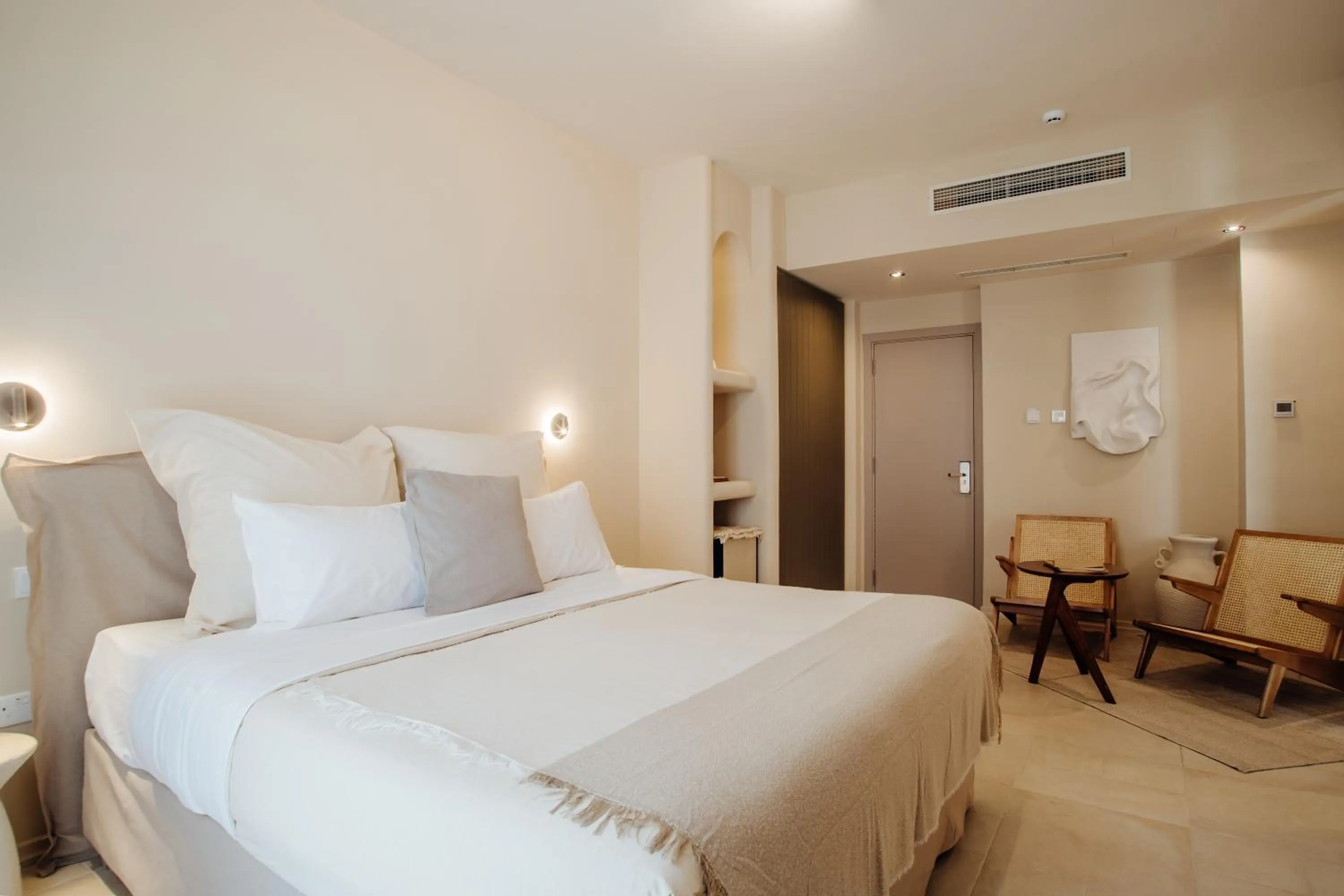 Bed in Thymises Boutique Hotel