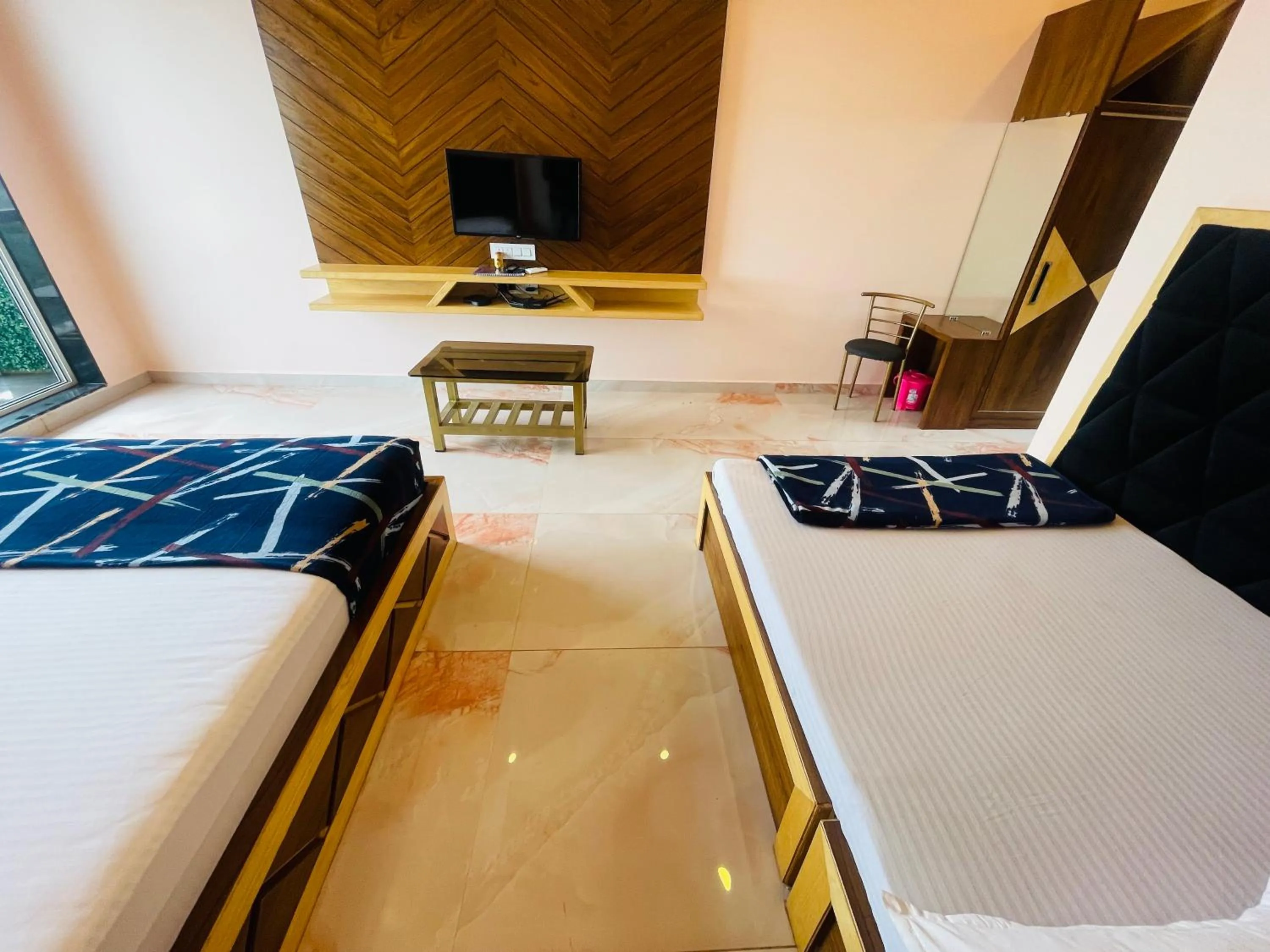 Bed in hotel saptarang residency panhala