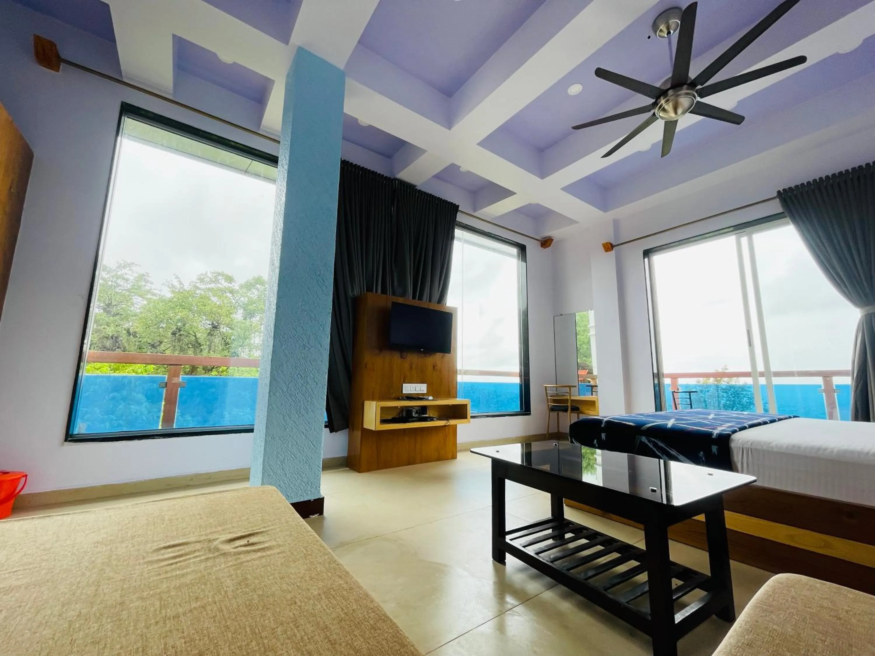 Communal lounge/ TV room, Bed in hotel saptarang residency panhala