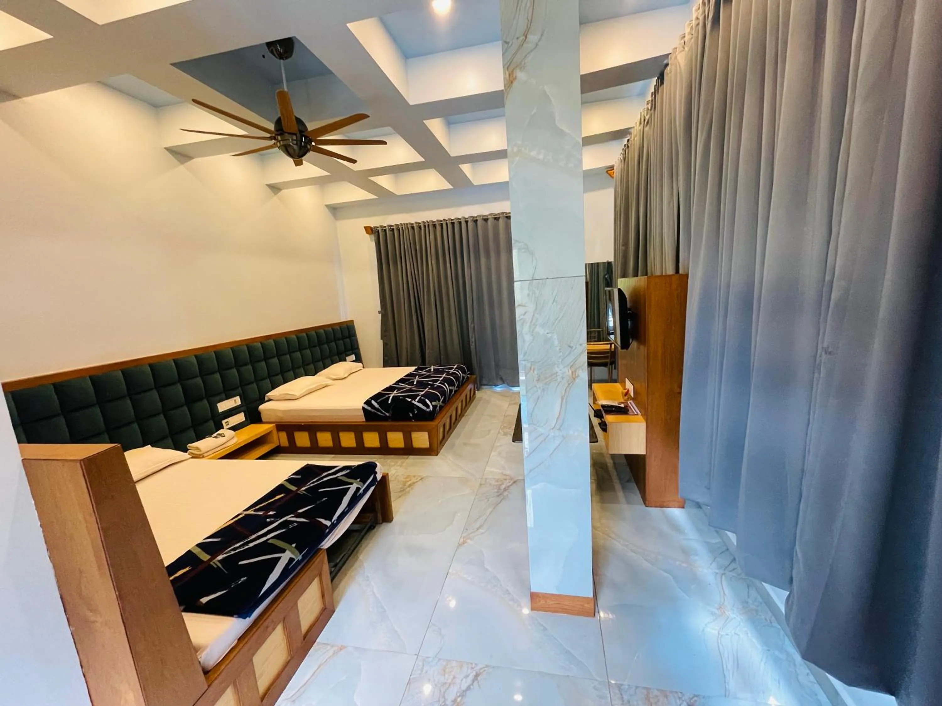 Bed in hotel saptarang residency panhala