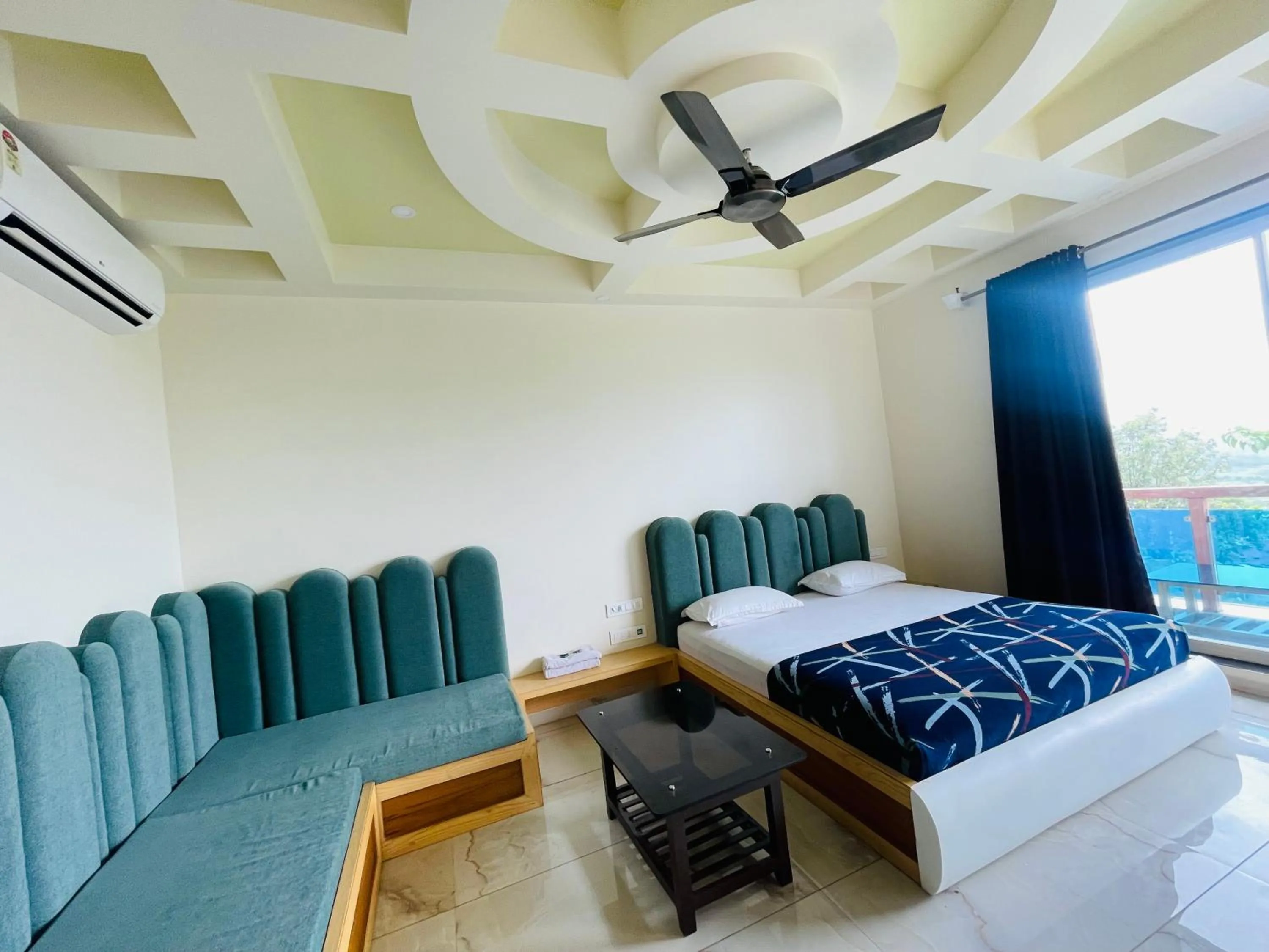 Bed in hotel saptarang residency panhala