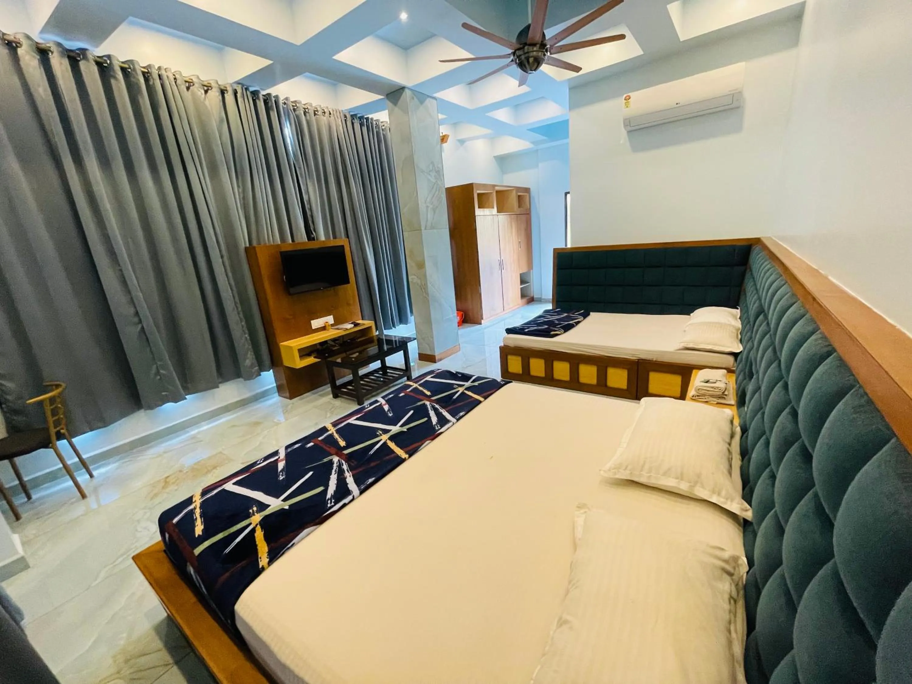 Bed in hotel saptarang residency panhala