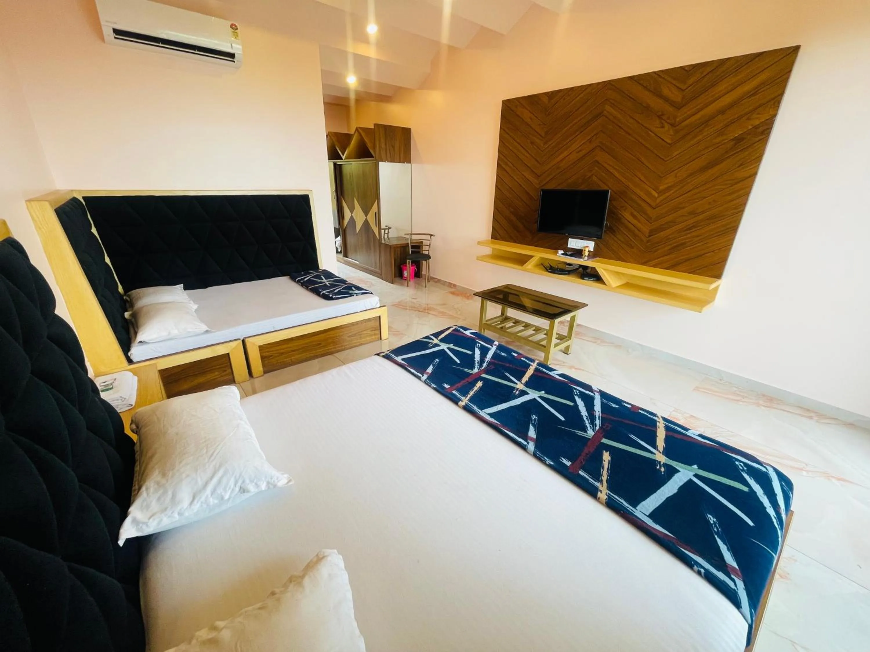 Bed in hotel saptarang residency panhala