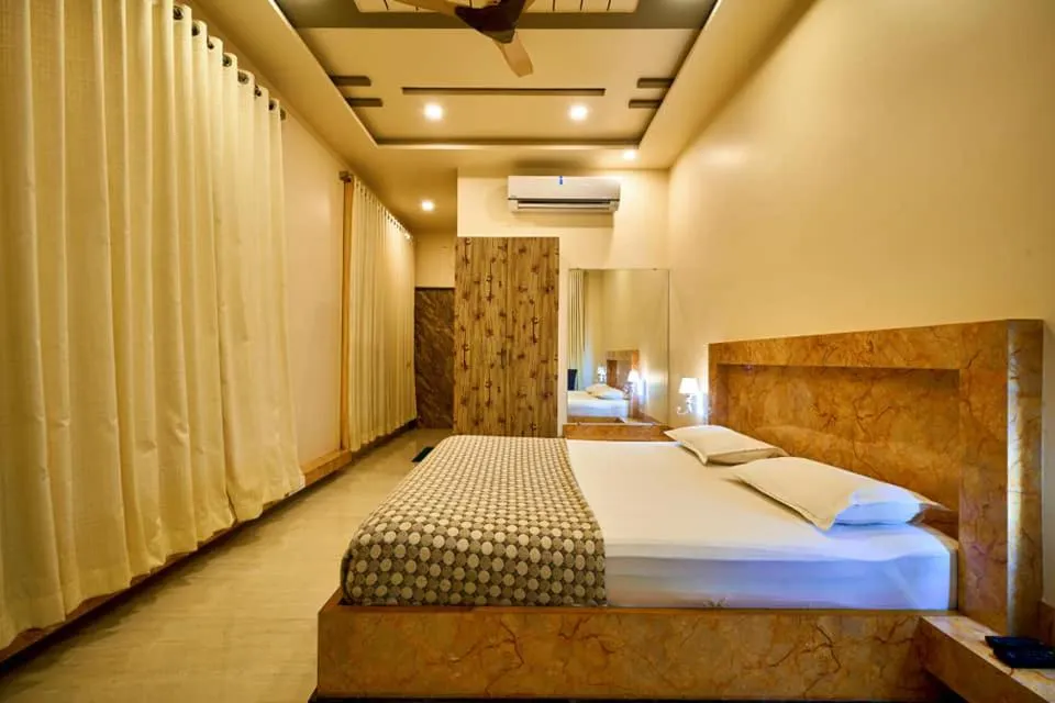 Bed in hotel saptarang residency panhala