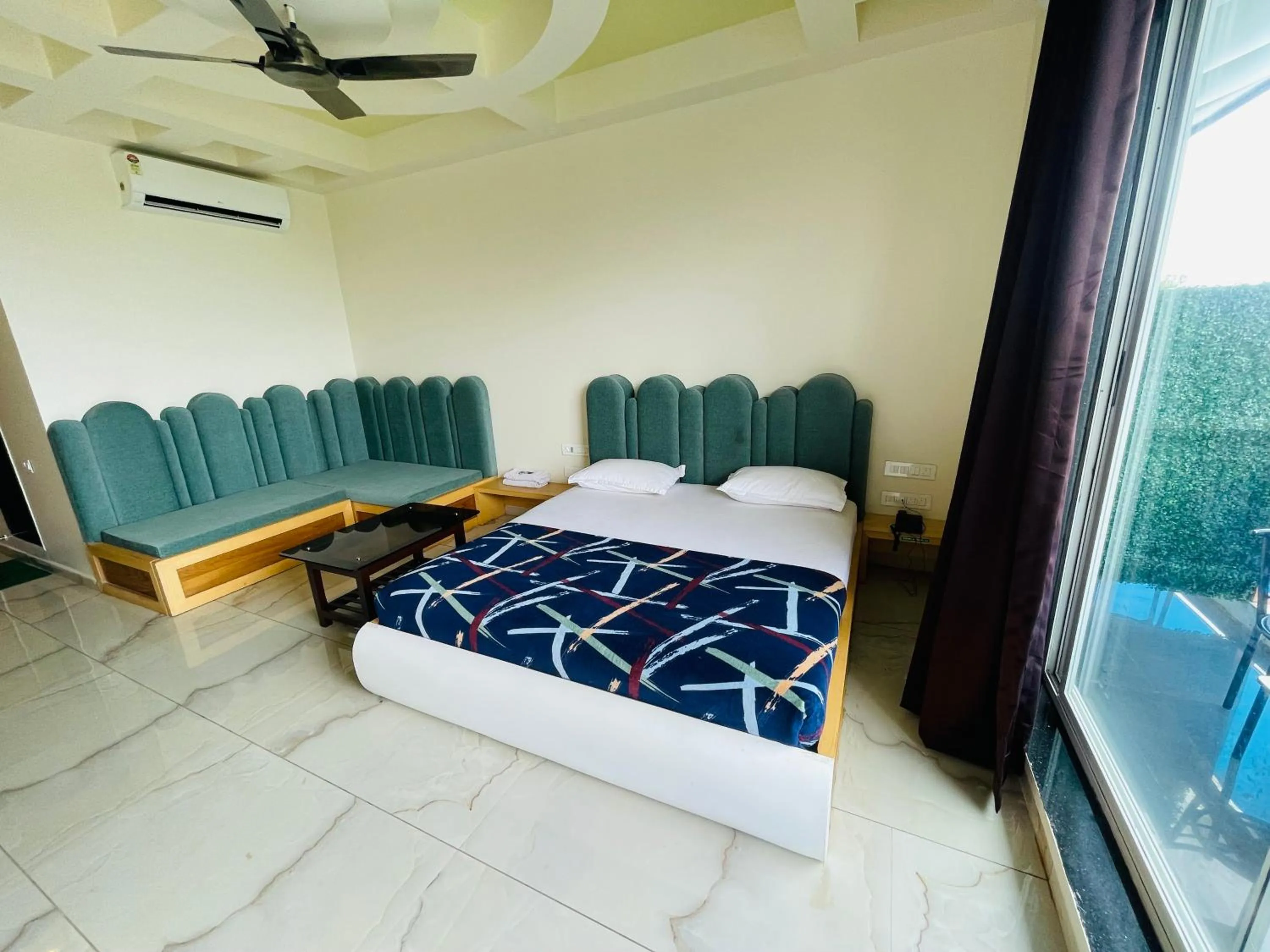 Bed in hotel saptarang residency panhala