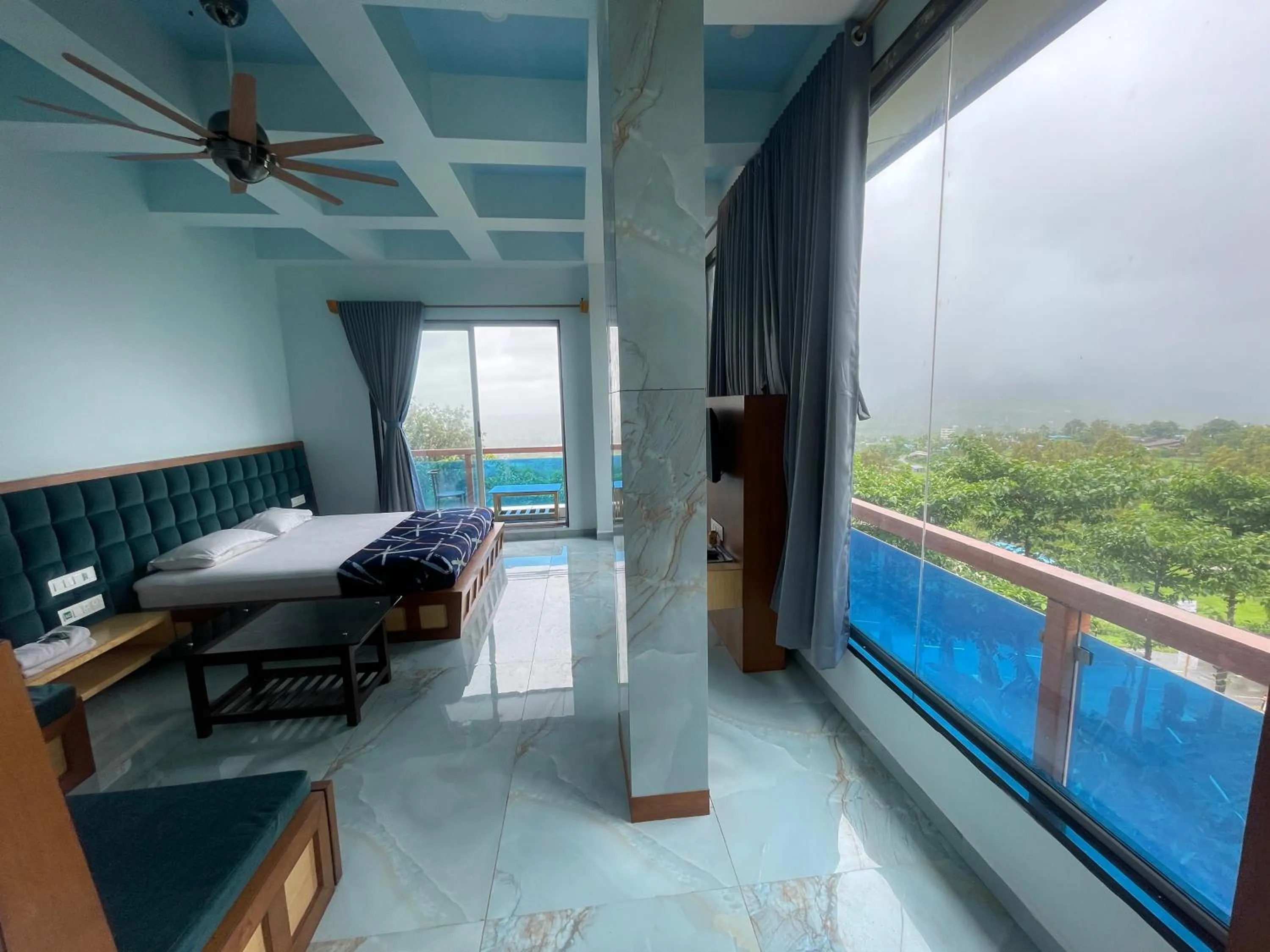 Bed in hotel saptarang residency panhala