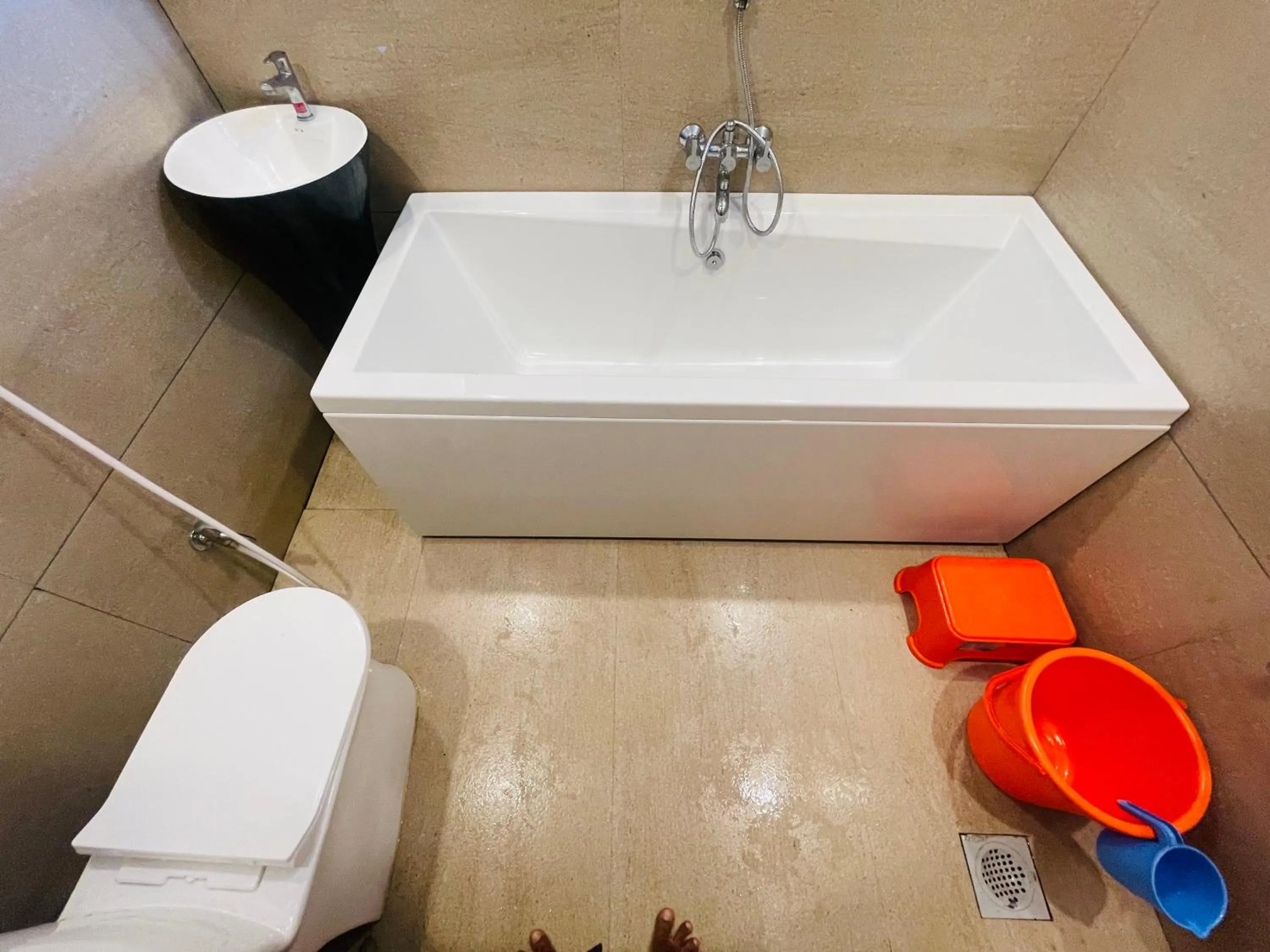 Shower in hotel saptarang residency panhala