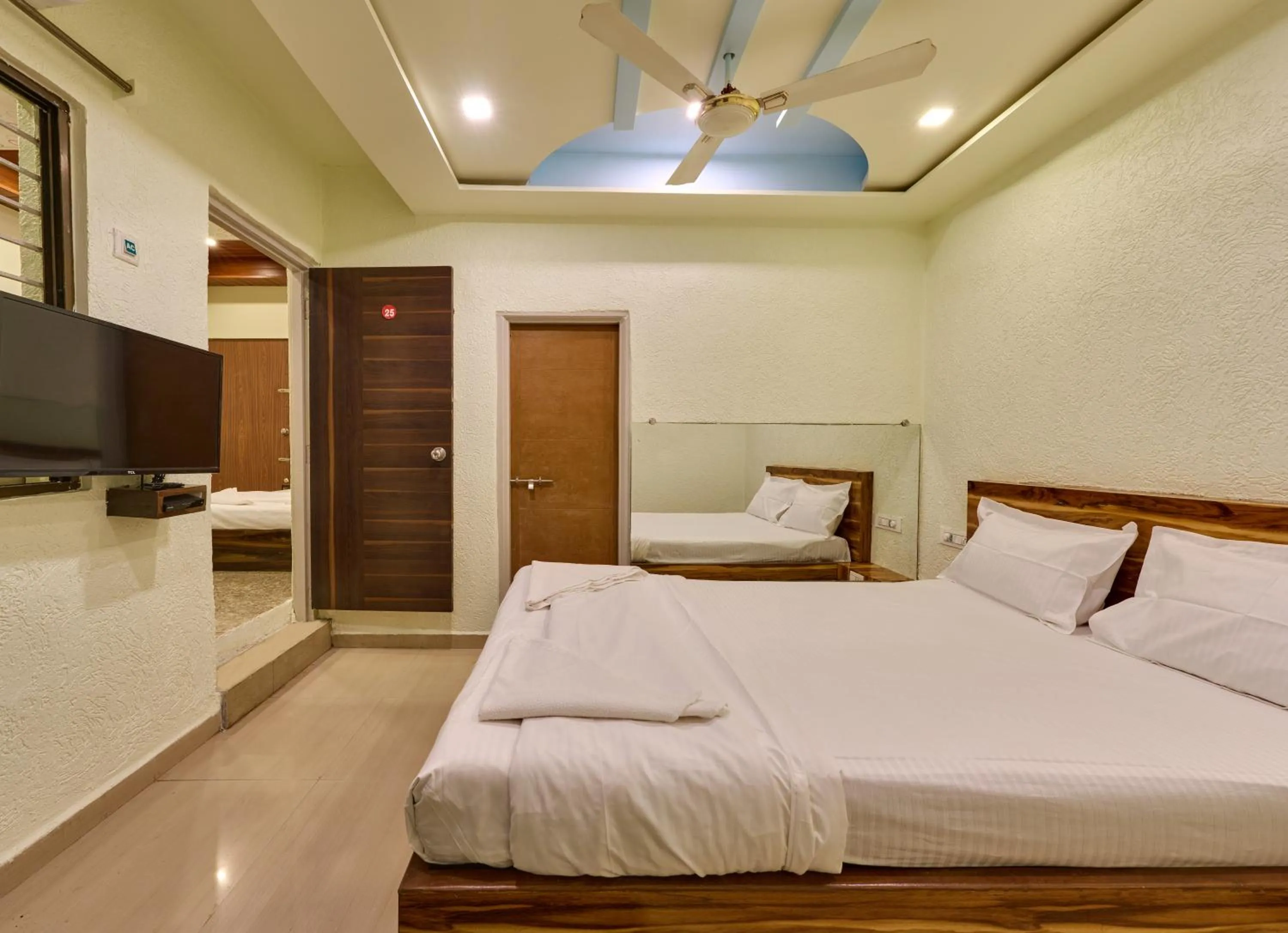 Bed in hotel saptarang residency panhala