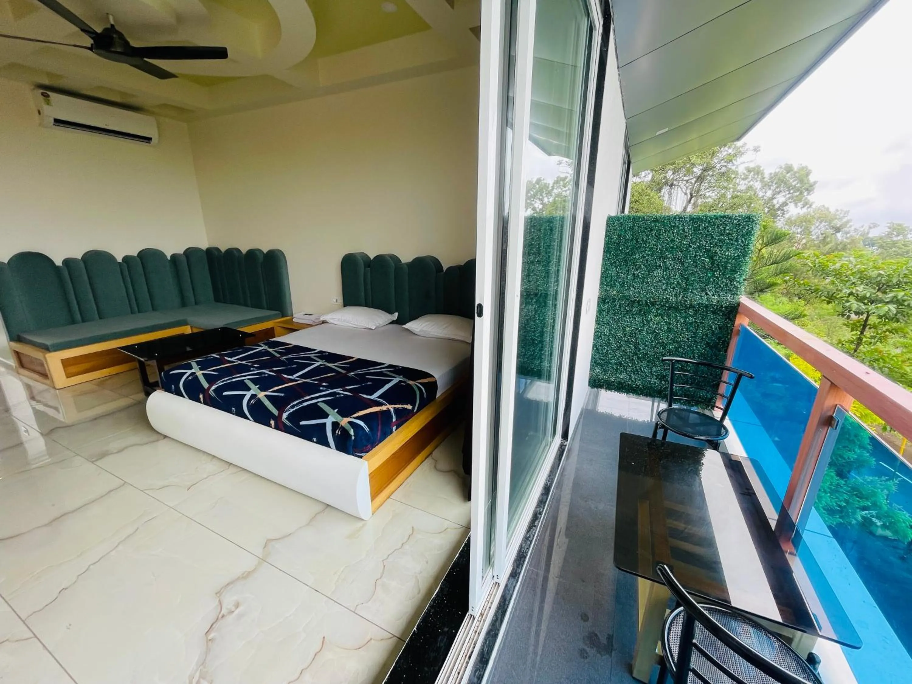 Bed in hotel saptarang residency panhala