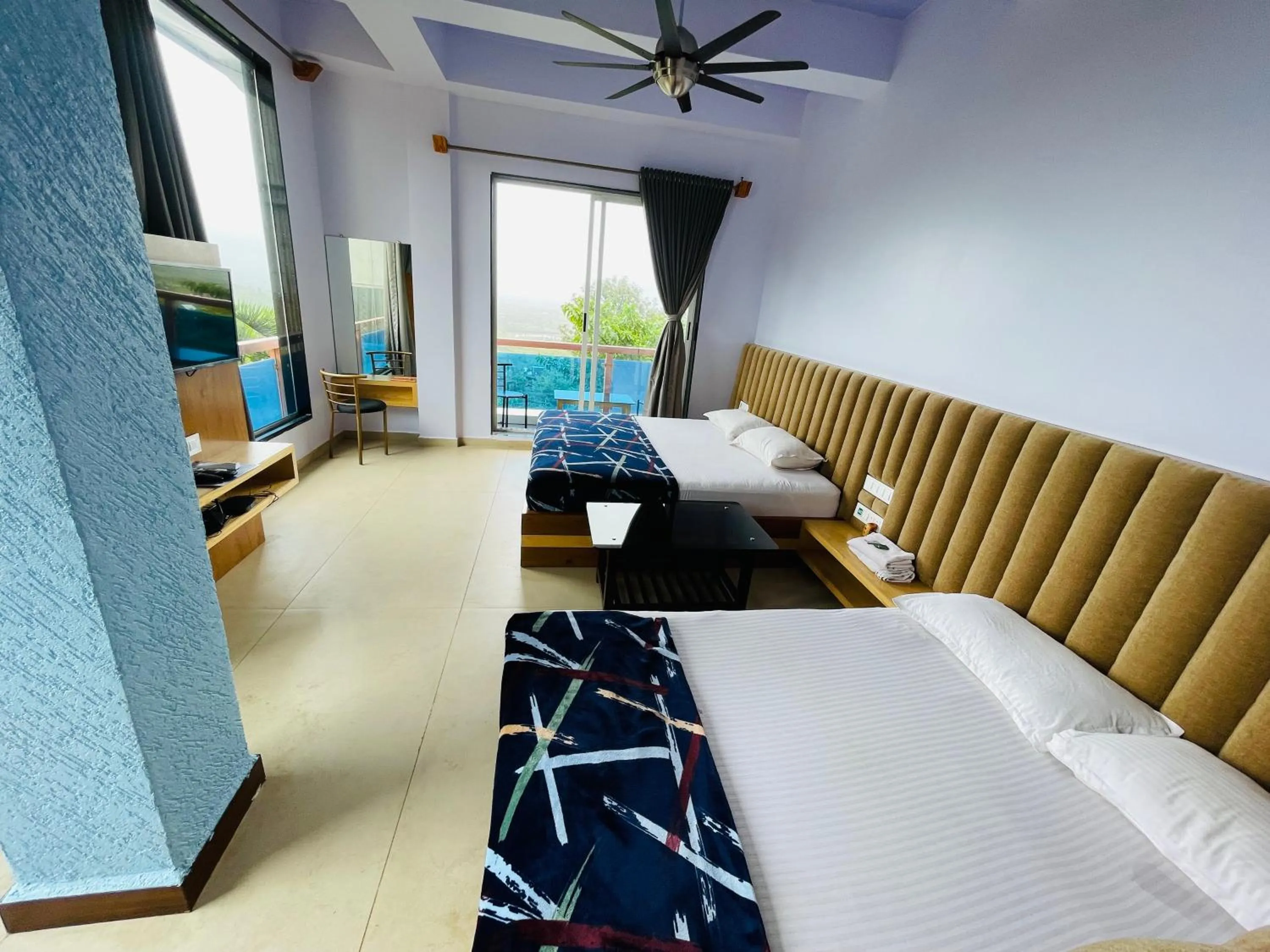 Bed in hotel saptarang residency panhala