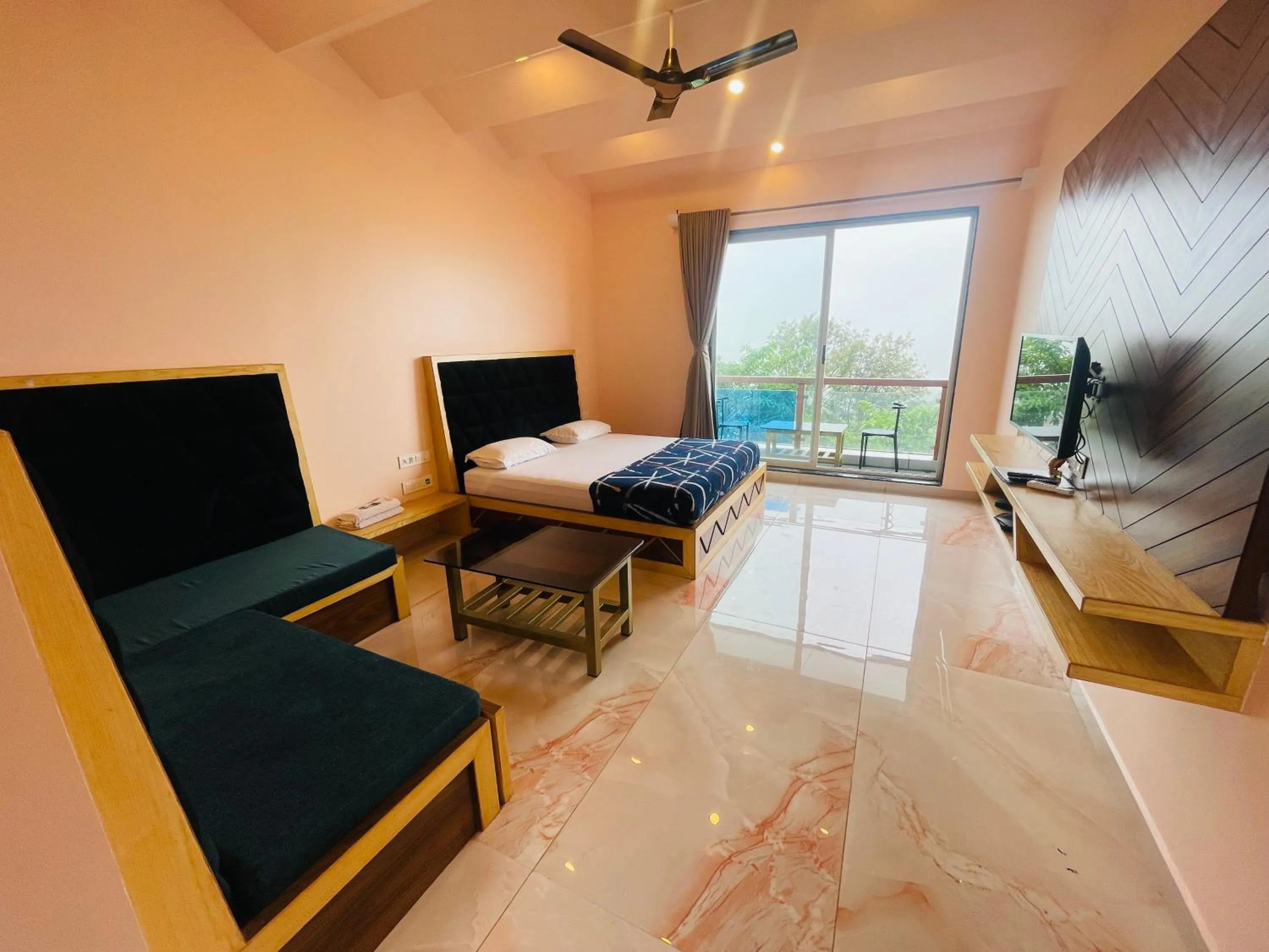 Bed in hotel saptarang residency panhala