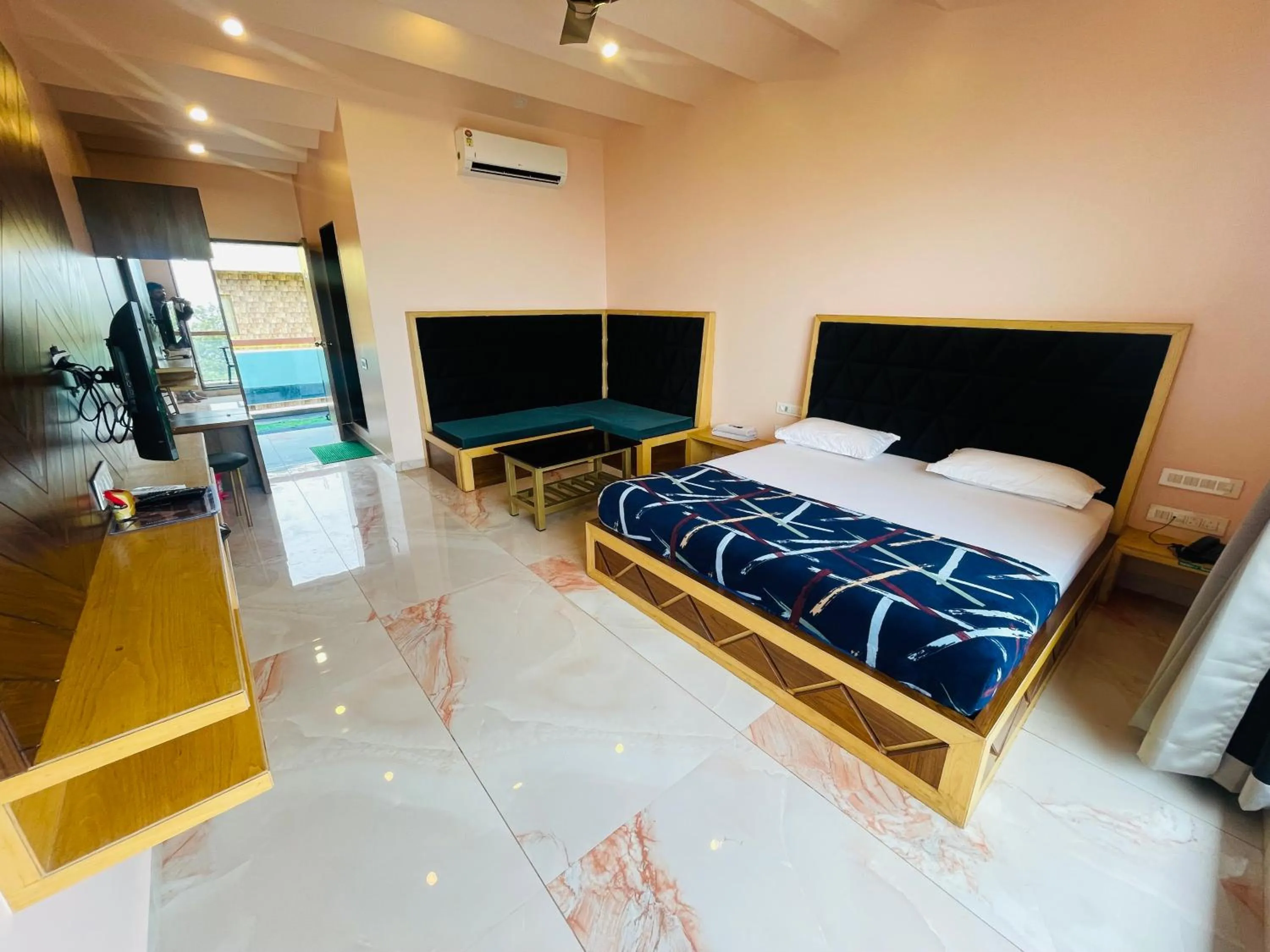 Bed in hotel saptarang residency panhala