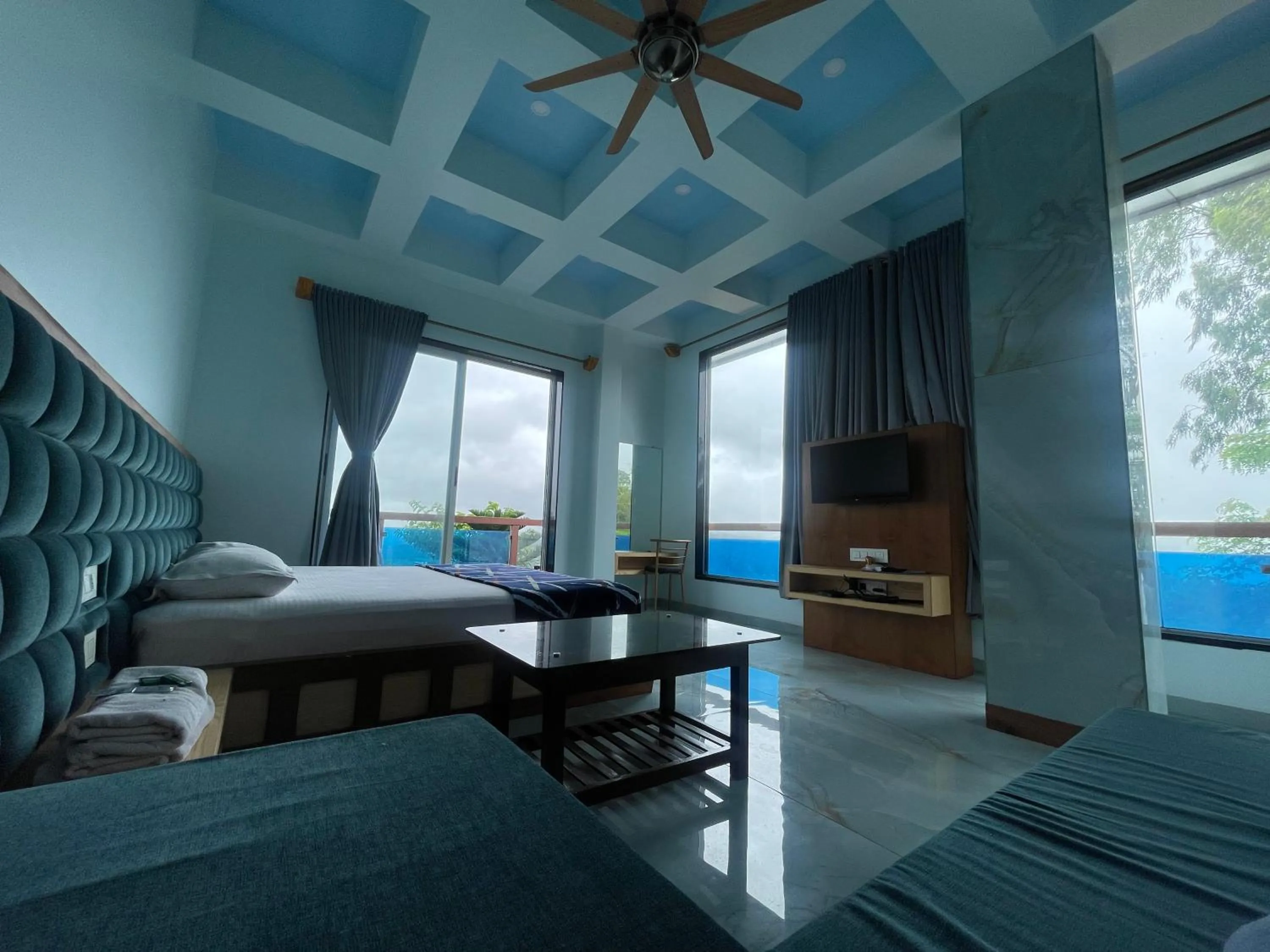 Communal lounge/ TV room, Bed in hotel saptarang residency panhala