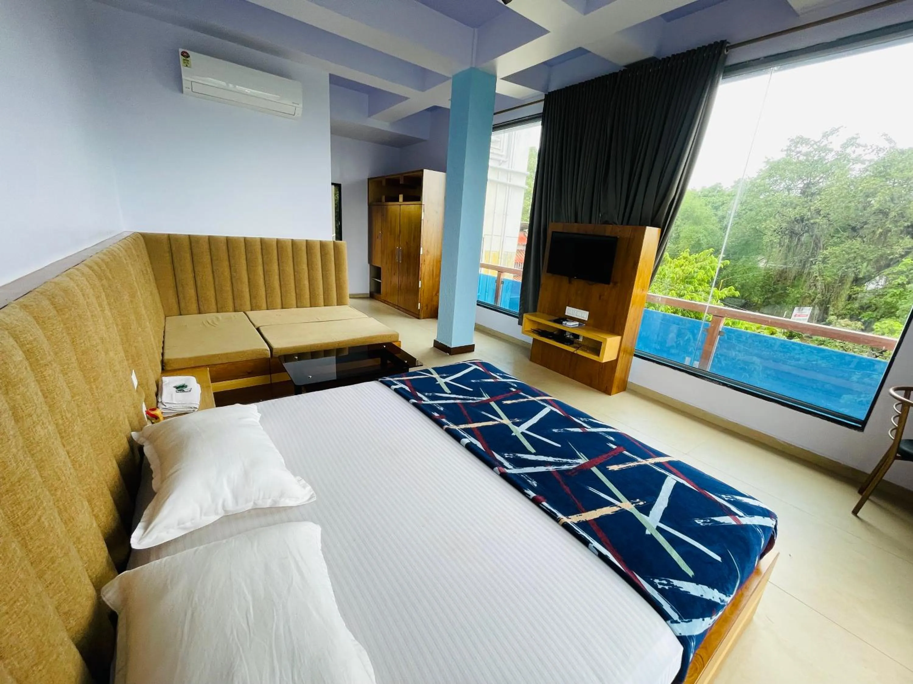 Communal lounge/ TV room, Bed in hotel saptarang residency panhala