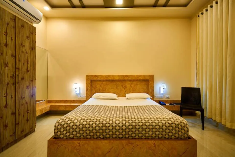 Bed in hotel saptarang residency panhala