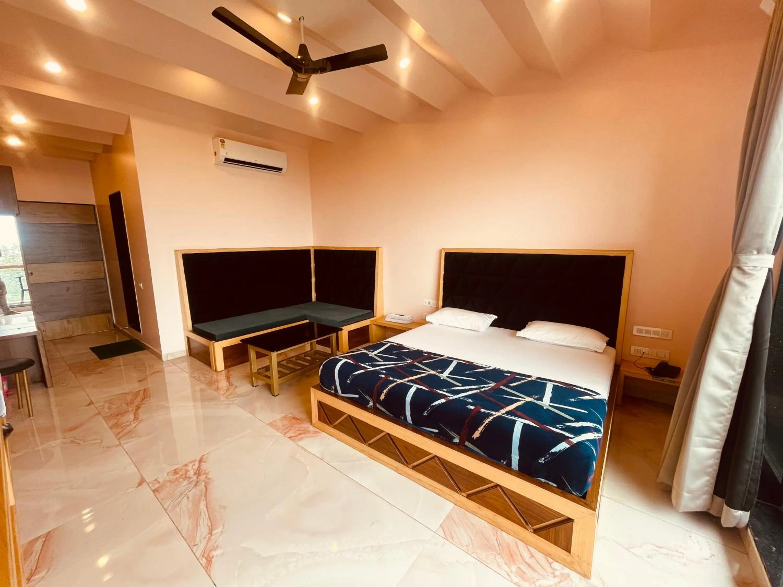 Bed in hotel saptarang residency panhala