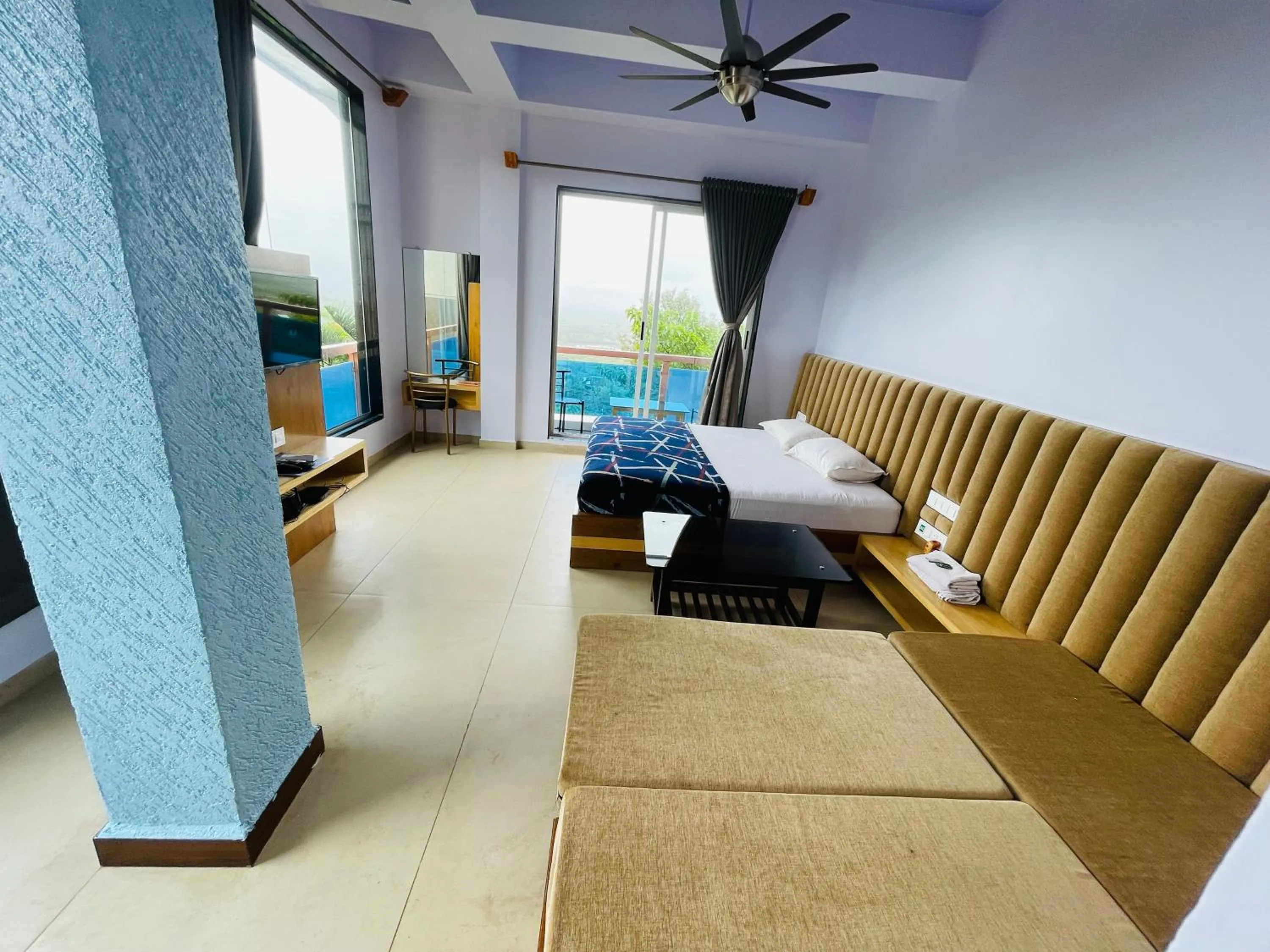 Bed in hotel saptarang residency panhala