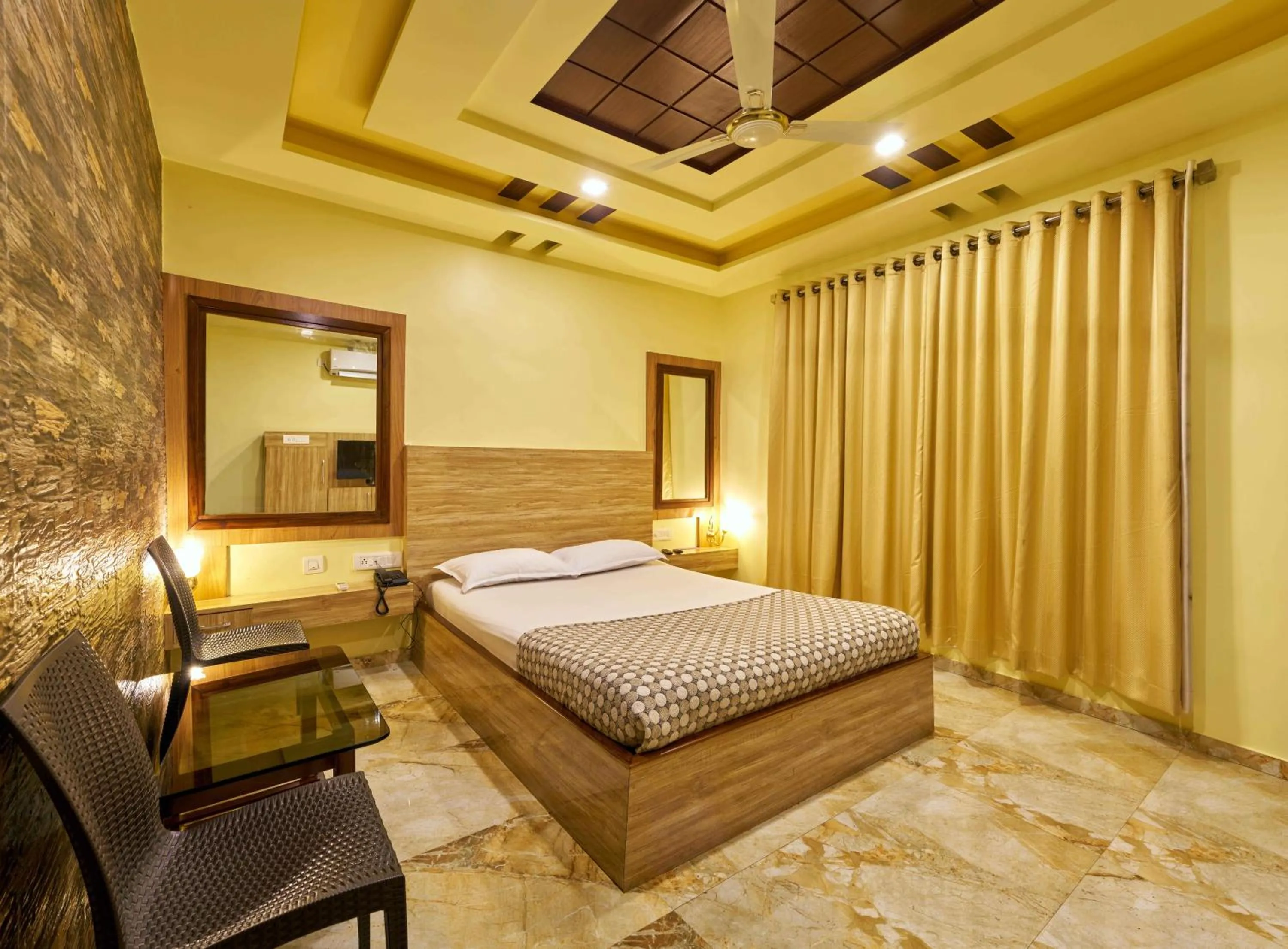 Bed in hotel saptarang residency panhala