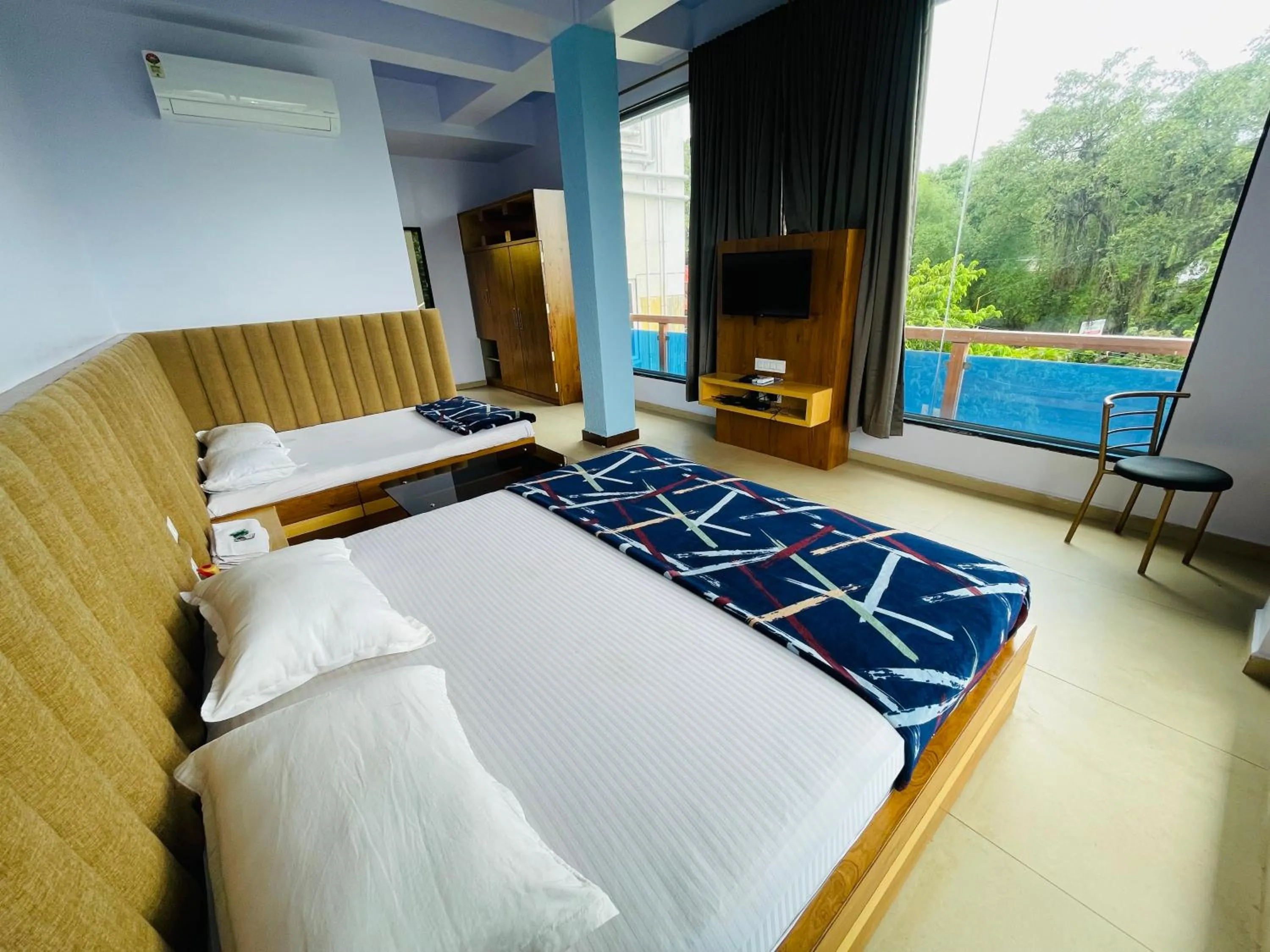 Bed in hotel saptarang residency panhala