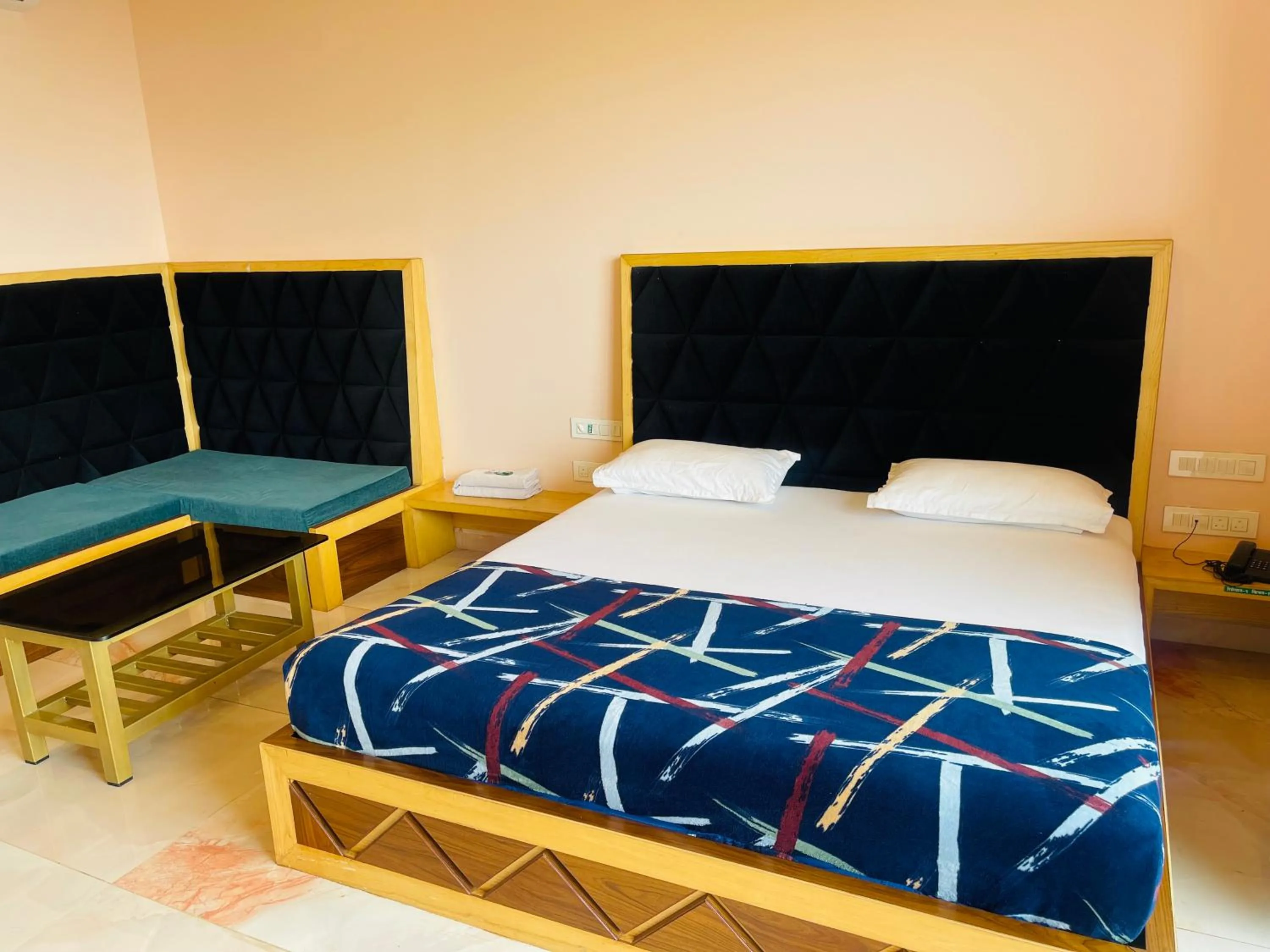 Bed in hotel saptarang residency panhala
