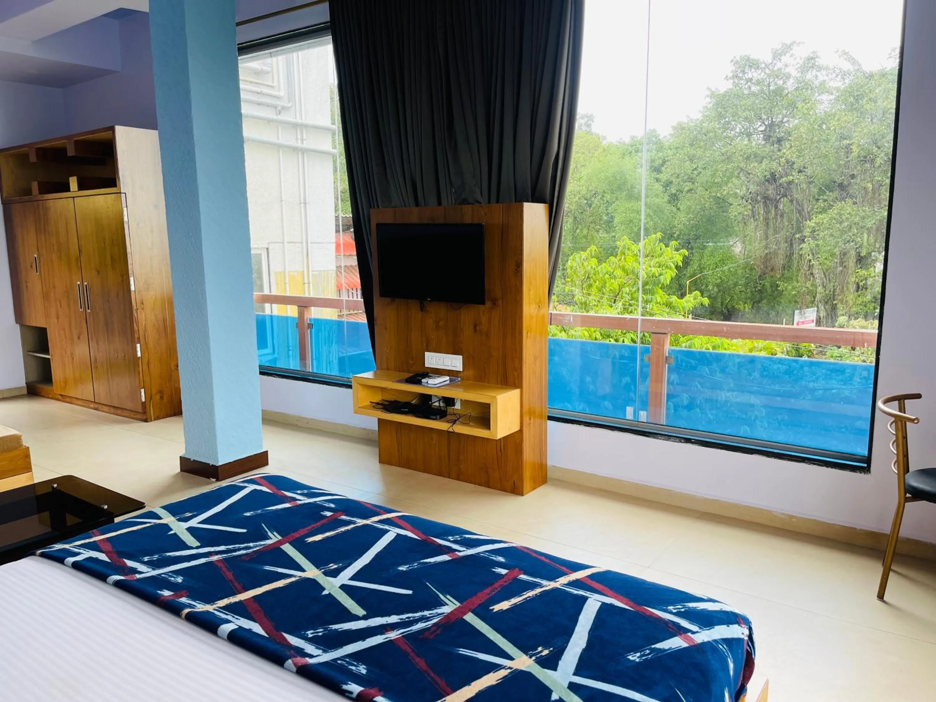 Bed in hotel saptarang residency panhala