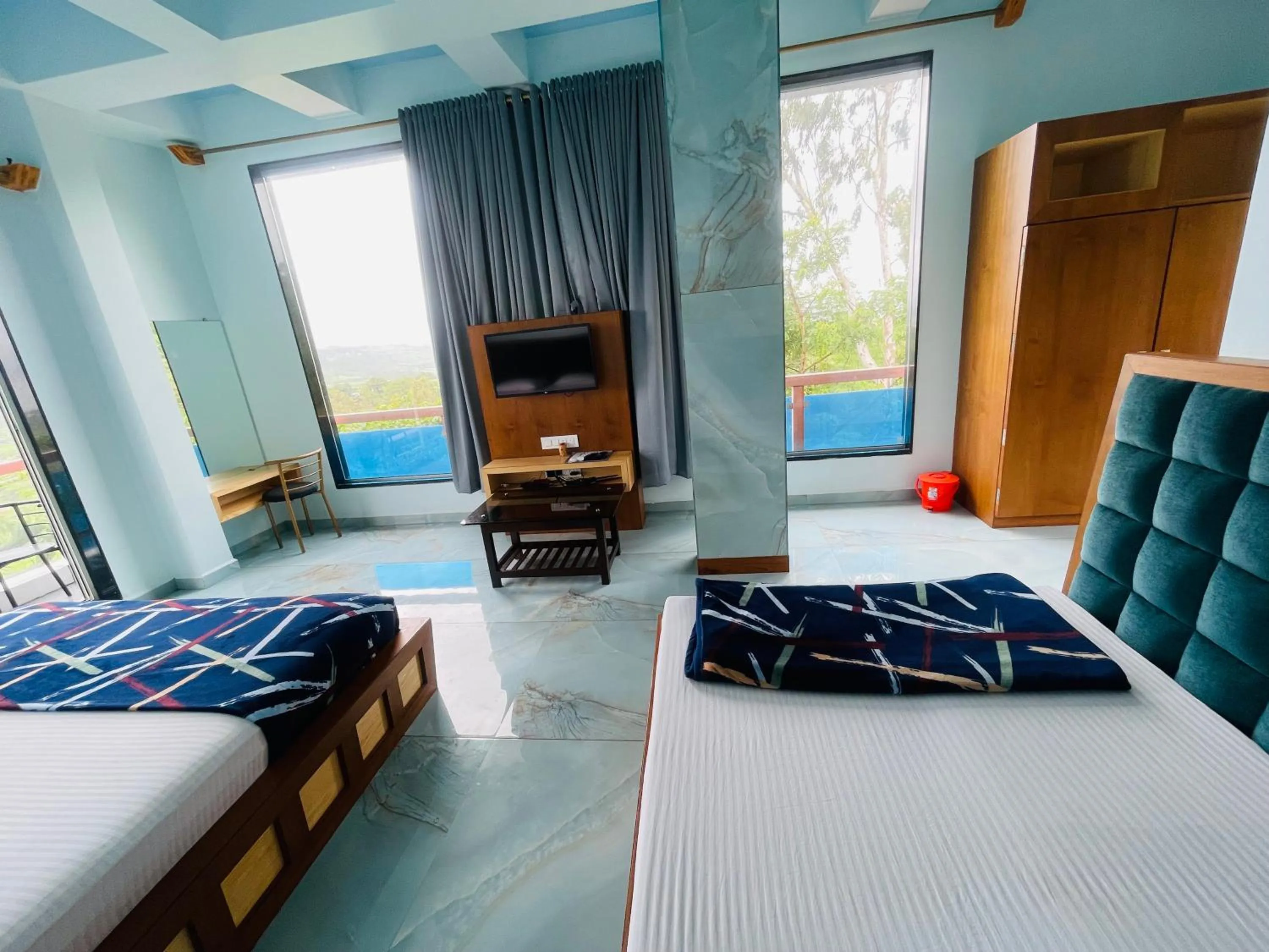 Bed in hotel saptarang residency panhala