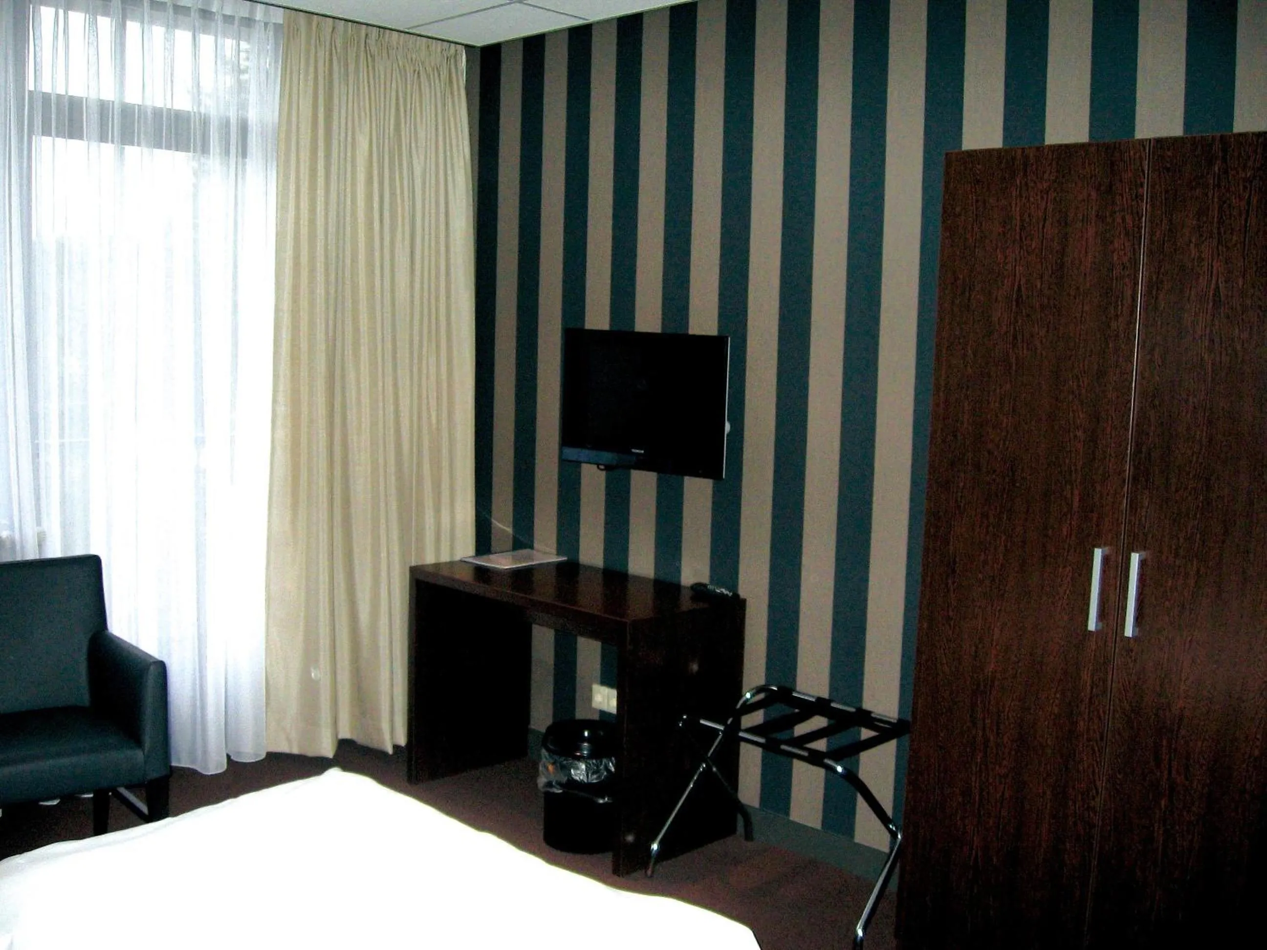 Photo of the whole room, Bed in Fletcher Hotel Restaurant Hellendoorn