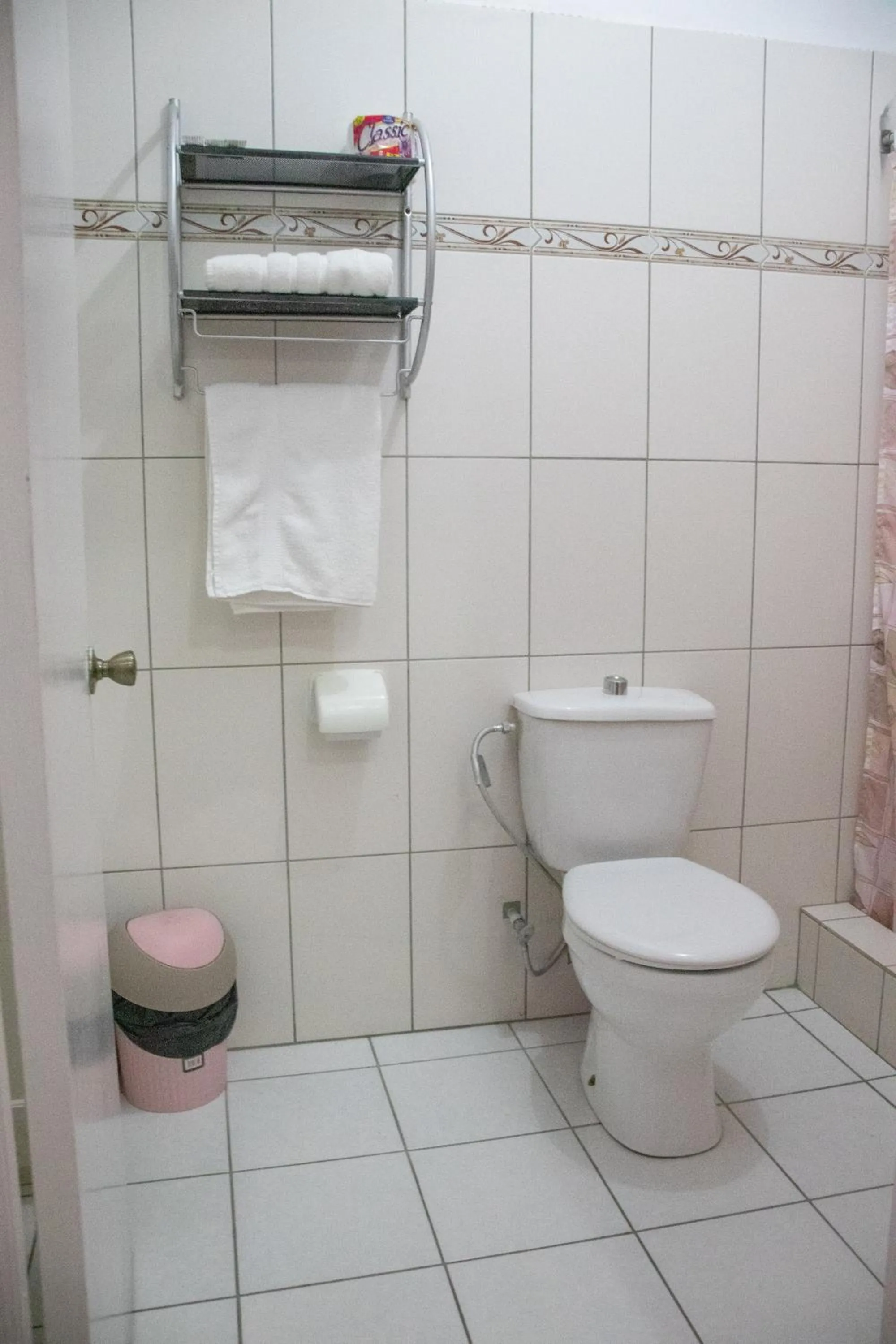 Toilet in La Flamboyant Hotel